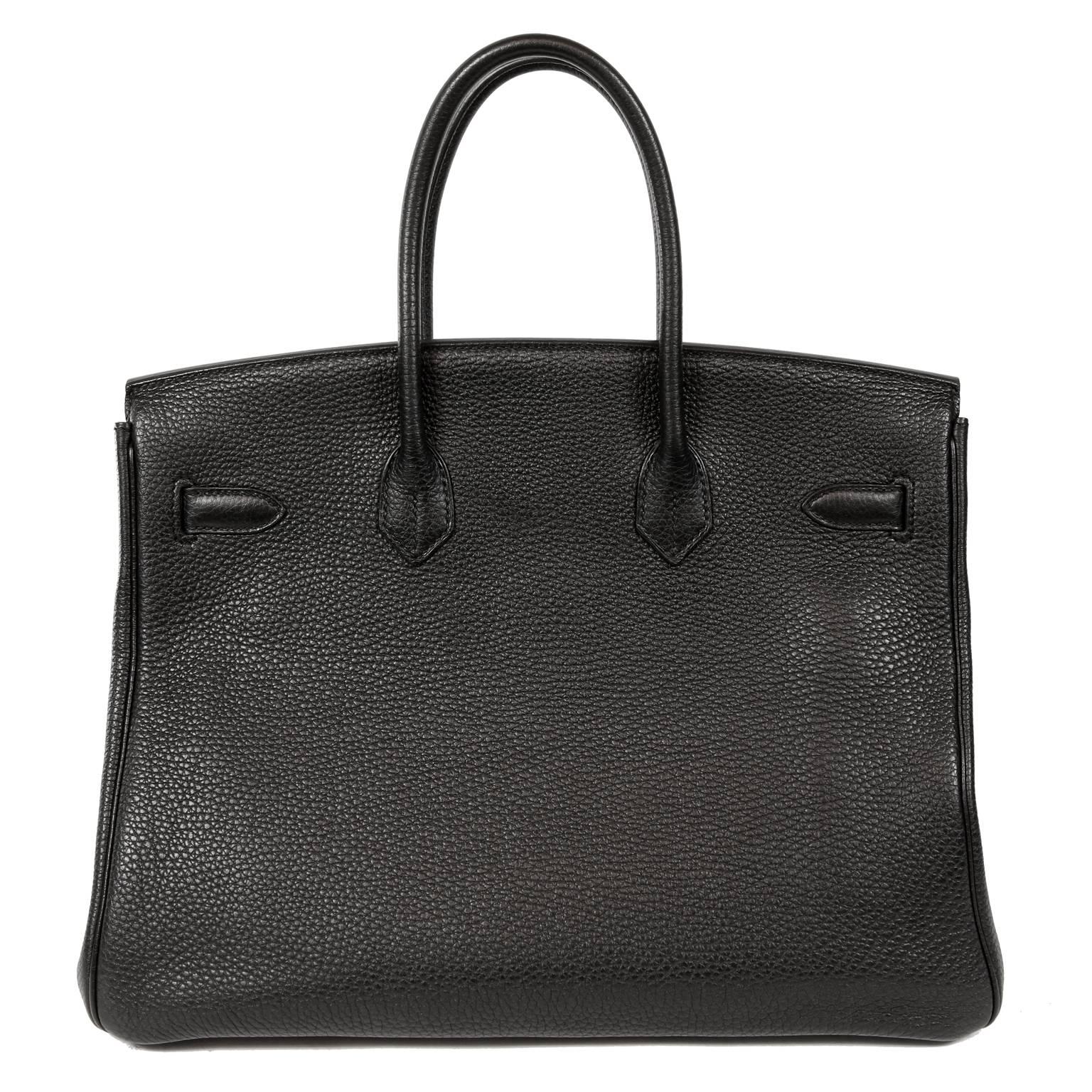 Hermès Black Togo Leather 35 cm Birkin Bag - Prisitne Condition
Possibly the most sought-after combination for the Birkin:  Black Togo with Palladium hardware.  Stitched entirely by hand, waitlists for the coveted Hermès Birkin can exceed a year.