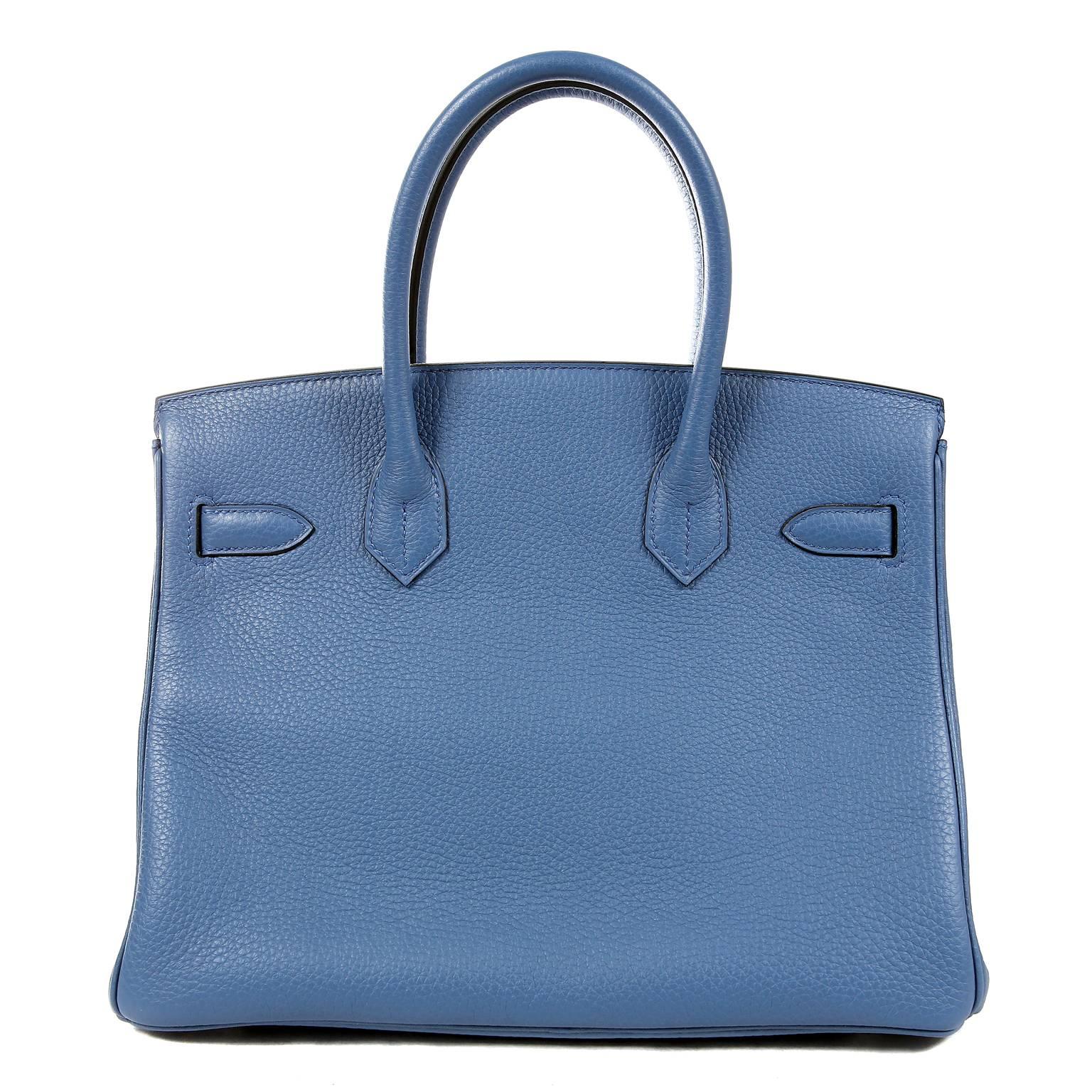 Hermès Blue Azur Togo 30 cm Birkin Bag- PRISTINE; Unworn with the protective plastic intact on the hardware.
Waitlists exceeding a year are commonplace for the intensely coveted Birkin bag.  Each piece is hand crafted by skilled artisans and