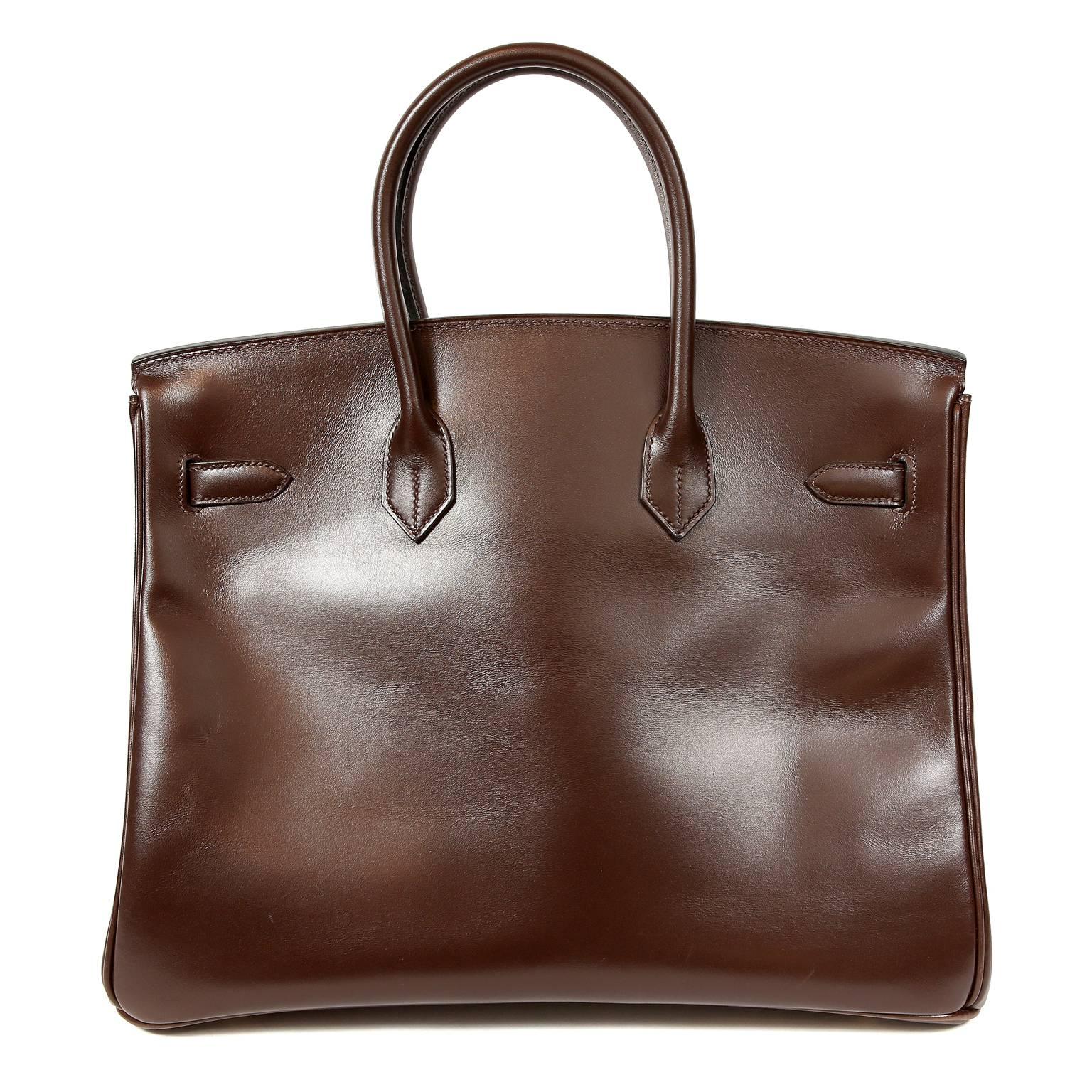 Hermès Chocolate Box Calf 35 cm Birkin- EXCELLENT
Hermès bags are considered the ultimate luxury item the world over.  Hand stitched by skilled craftsmen, wait lists of a year or more are commonplace. 
Box Calf is one of the original Hermès