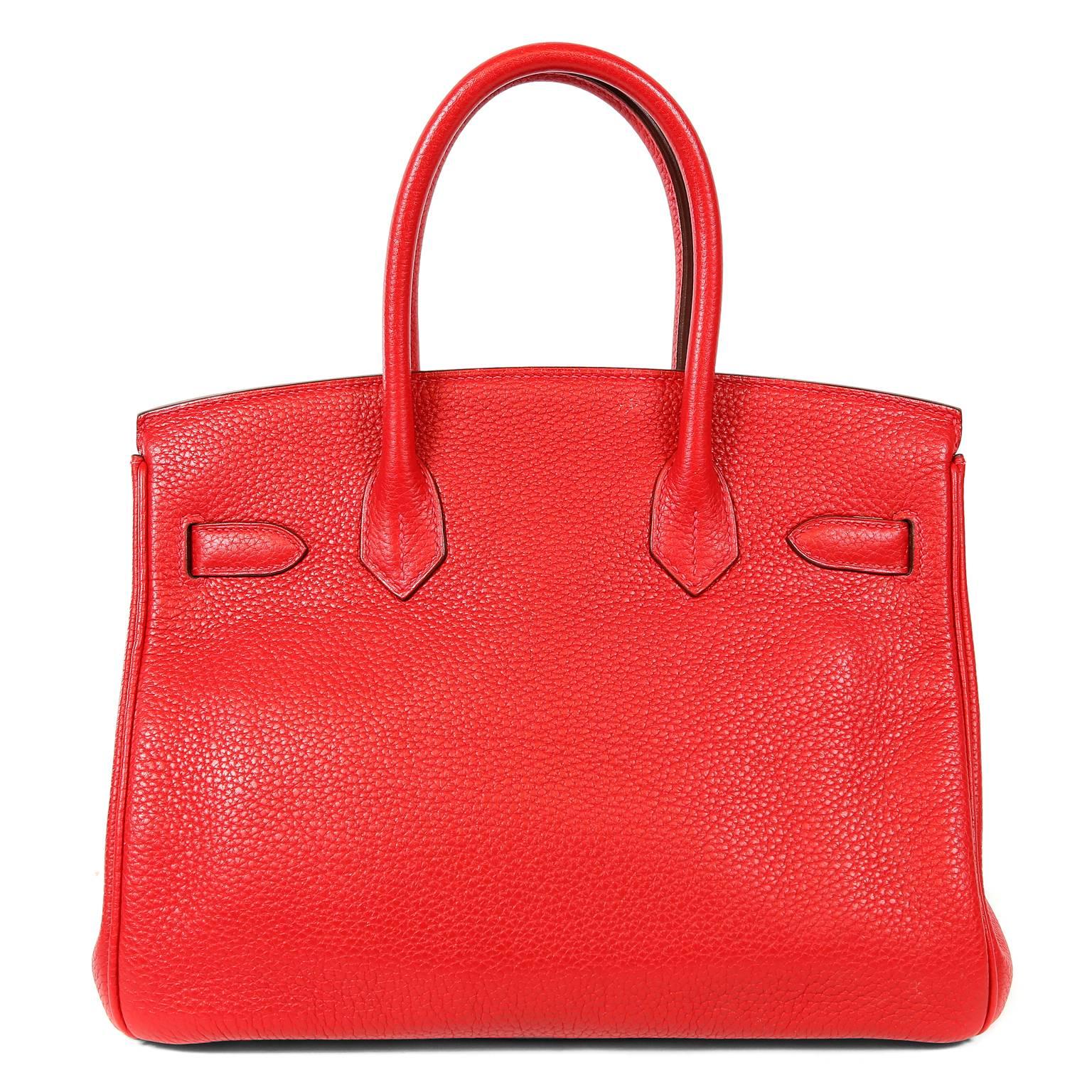 Hermès Rouge H Togo 30 cm Birkin- Pristine overall condition
Hand stitched by skilled craftsmen, wait lists of a year or more are not uncommon for the Hermès Birkin. They are considered the ultimate in luxury fashion.
Togo is highly desirable
