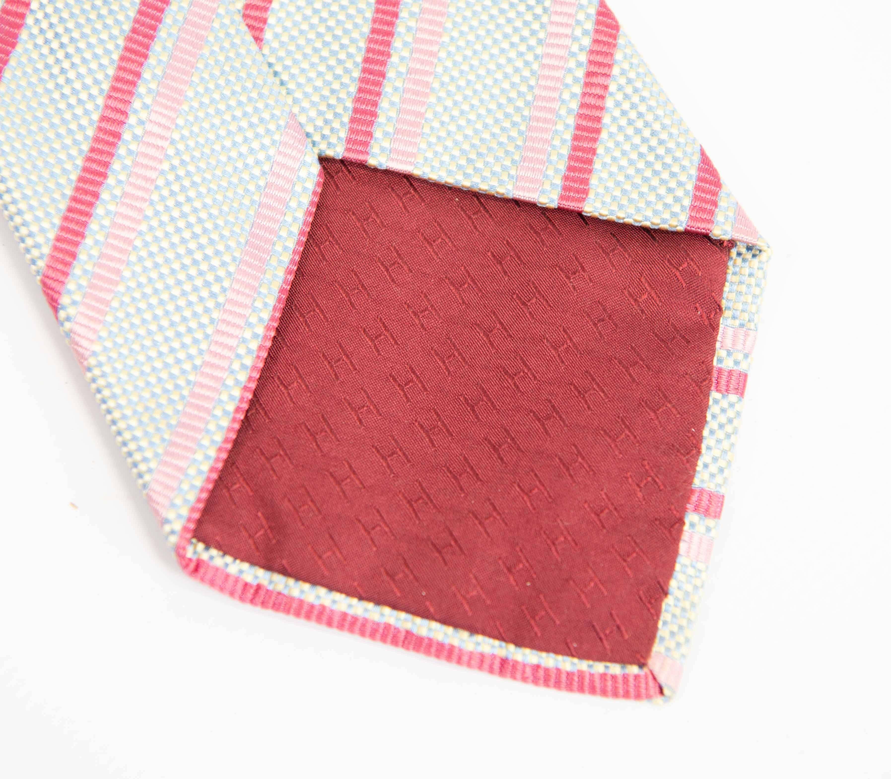 French Hermès Silk Tie Made in Paris, France in Pink, Red and Yellow and Blue Hues For Sale