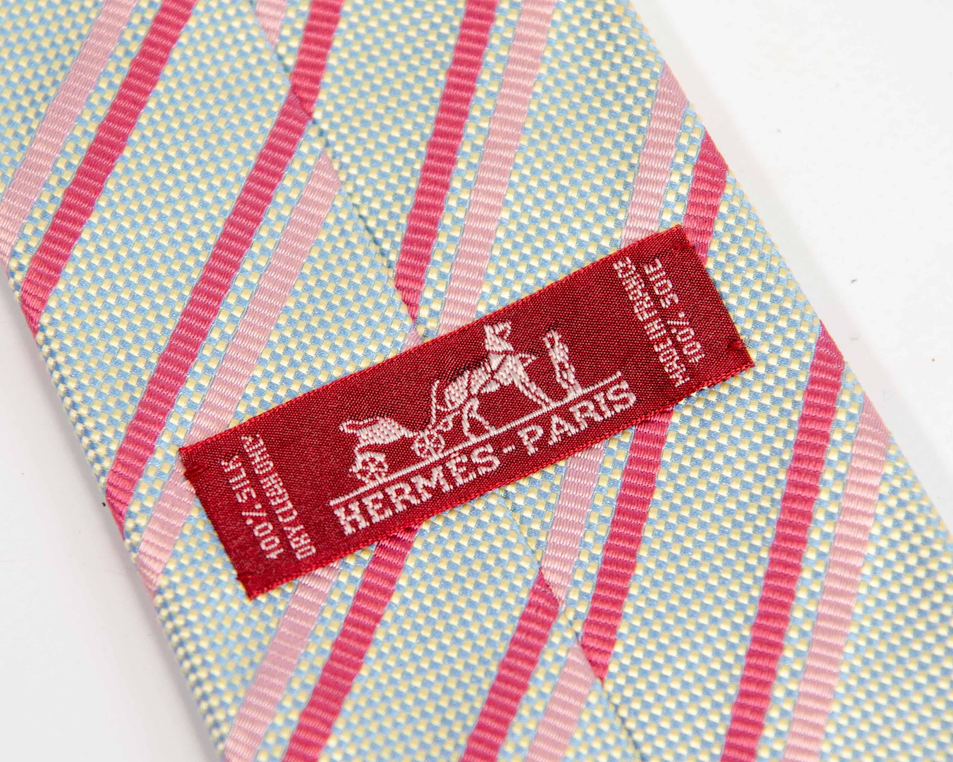 Hermès Silk Tie Made in Paris, France in Pink, Red and Yellow and Blue Hues In Excellent Condition For Sale In Wingene, BE