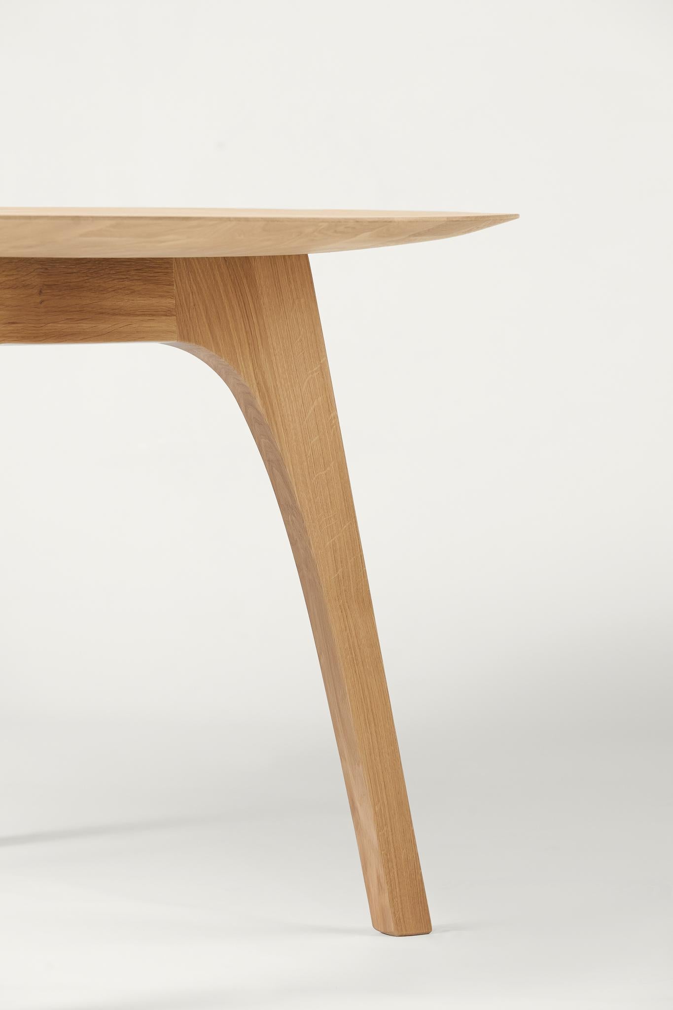 The heron-table is both perfect for a private home as wel I as for professional spaces.
 
Its carved, solid oak tabletop gives it a light, sublime appearance and the contour of the legs resembles the flowing lines of the heron-chair’s backrest or