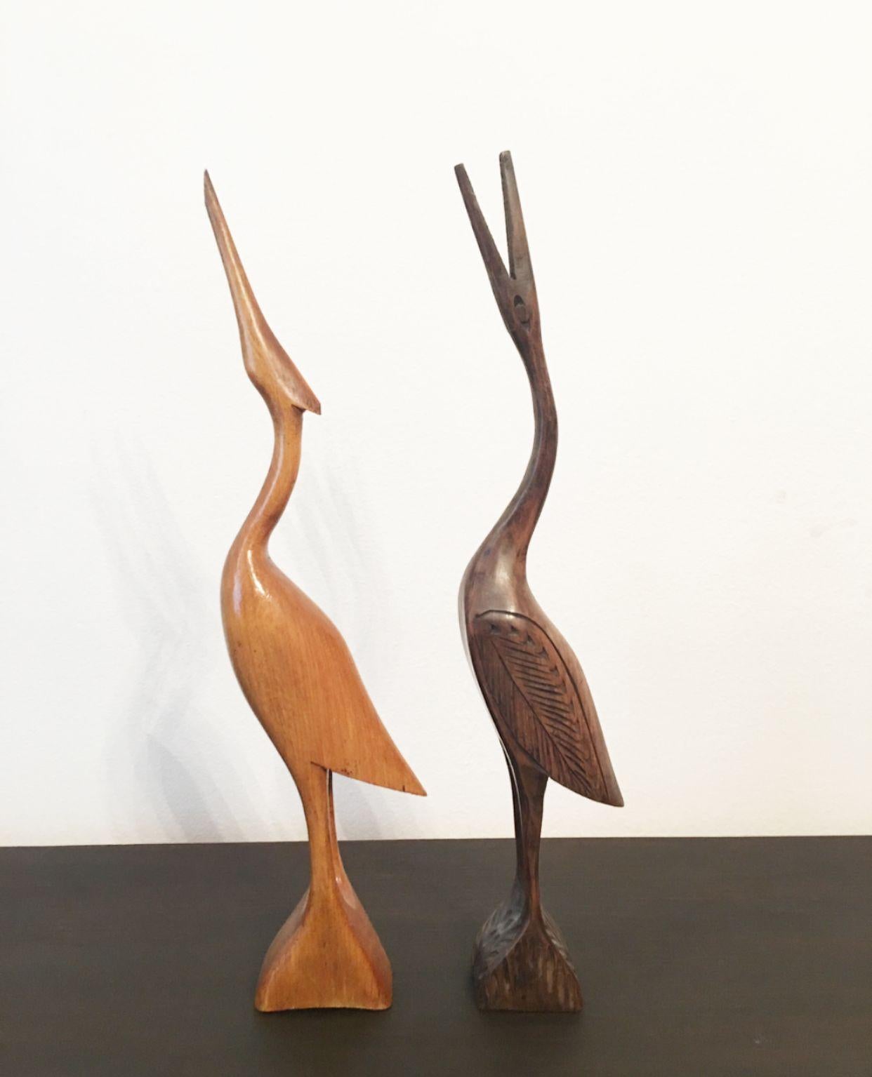 Late 20th Century Herons, Two Wooden Statues