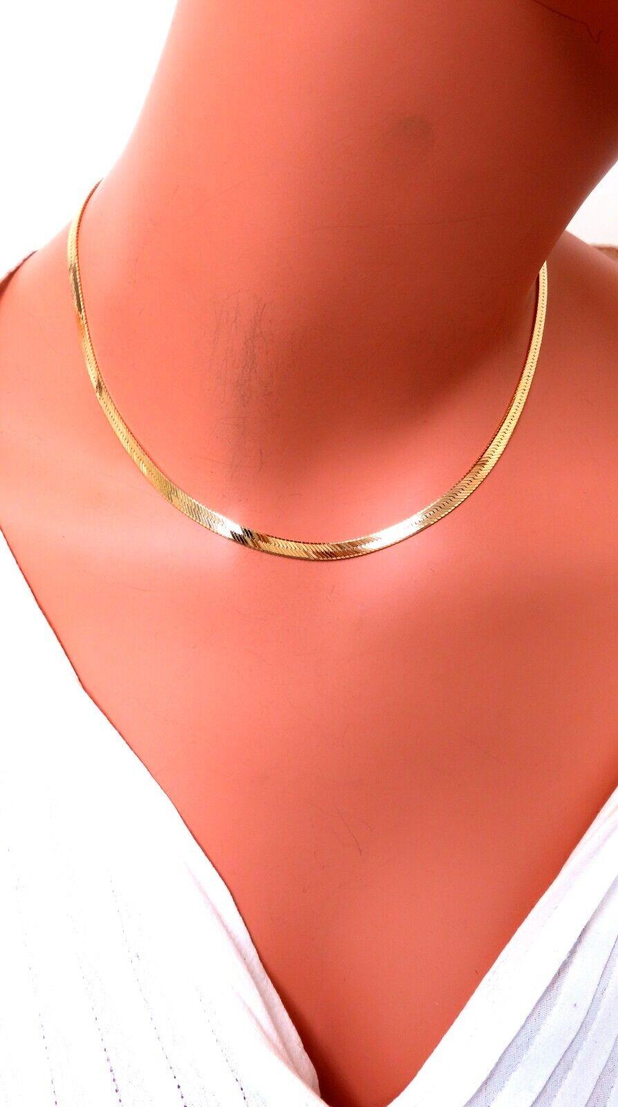 Herringbone Flat 4mm

14kt. Yellow gold

11.8 grams 

16 inches = wearable length