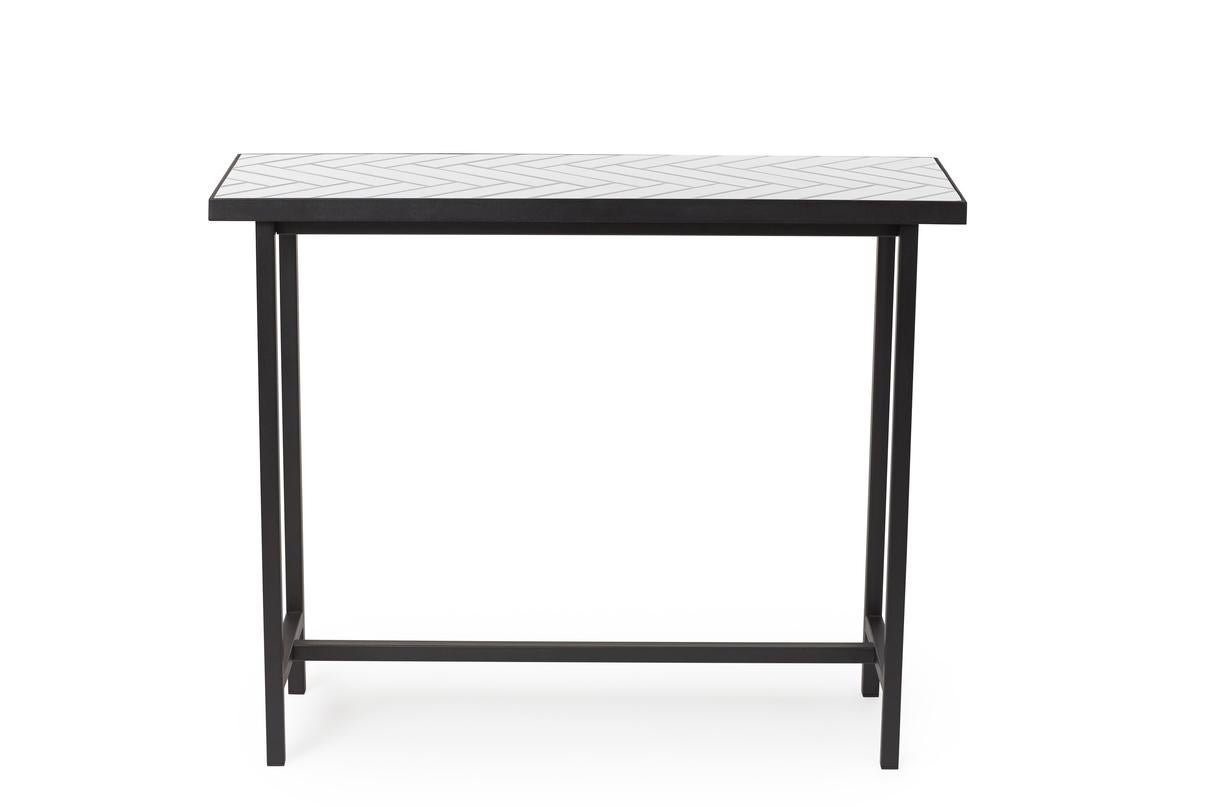 Herringbone tile console table white tiles black steel by Warm Nordic
Dimensions: D100 x W35 x H80 cm
Material: Ceramic tiles, MDF, Powder coated steel
Weight: 20 kg
Also available in different finishes and dimensions. 

Exclusive console table with
