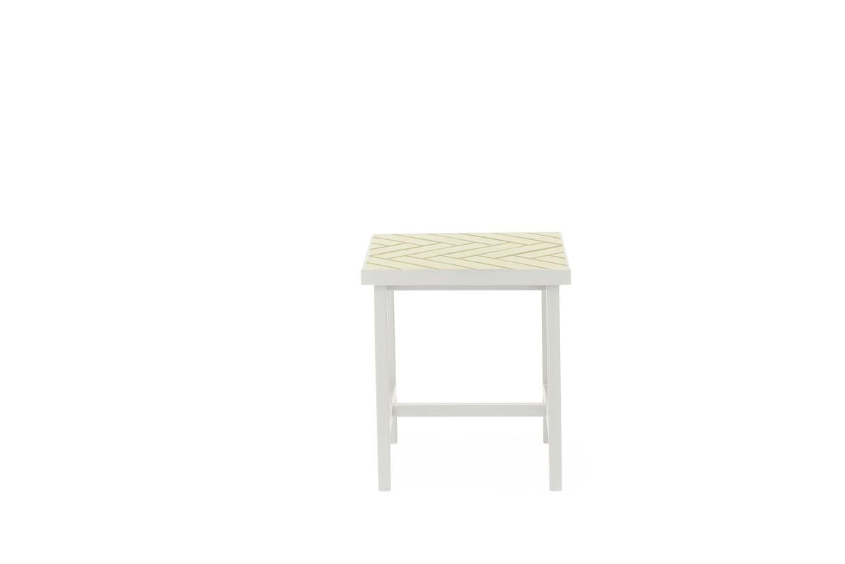 Herringbone tile side table butter yellow warm white steel by Warm Nordic
Dimensions: D40 x W40 x H44 cm
Material: Ceramic tiles, MDF, Powder coated steel
Weight: 15 kg
Also available in different finishes and dimensions. 

Exclusive side