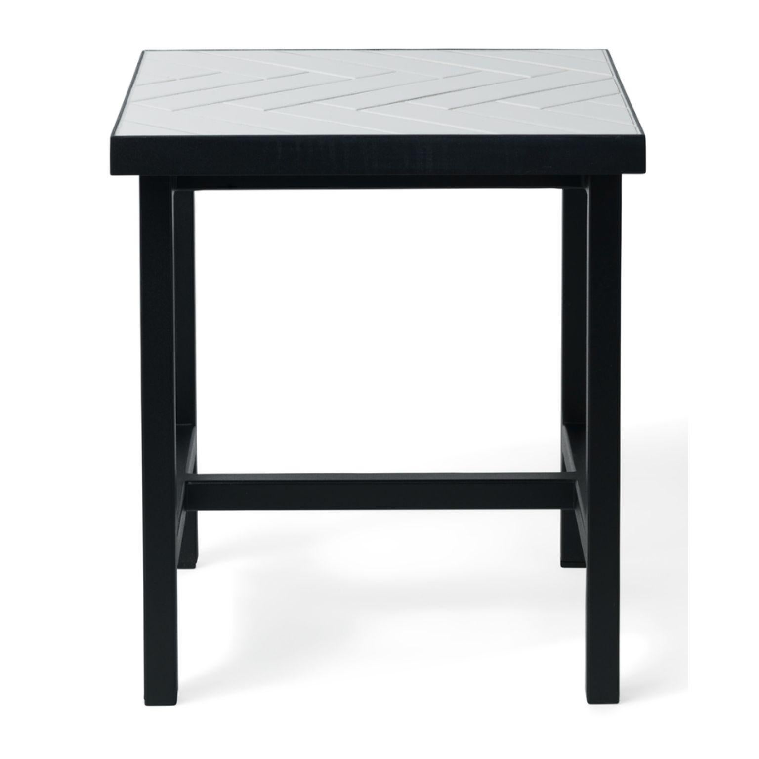 Herringbone tile side table pure white tiles soft black steel by Warm Nordic
Dimensions: D40 x W40 x H44 cm
Material: Ceramic tiles, MDF, Powder coated steel
Weight: 15 kg
Also available in different finishes and dimensions.

Exclusive side