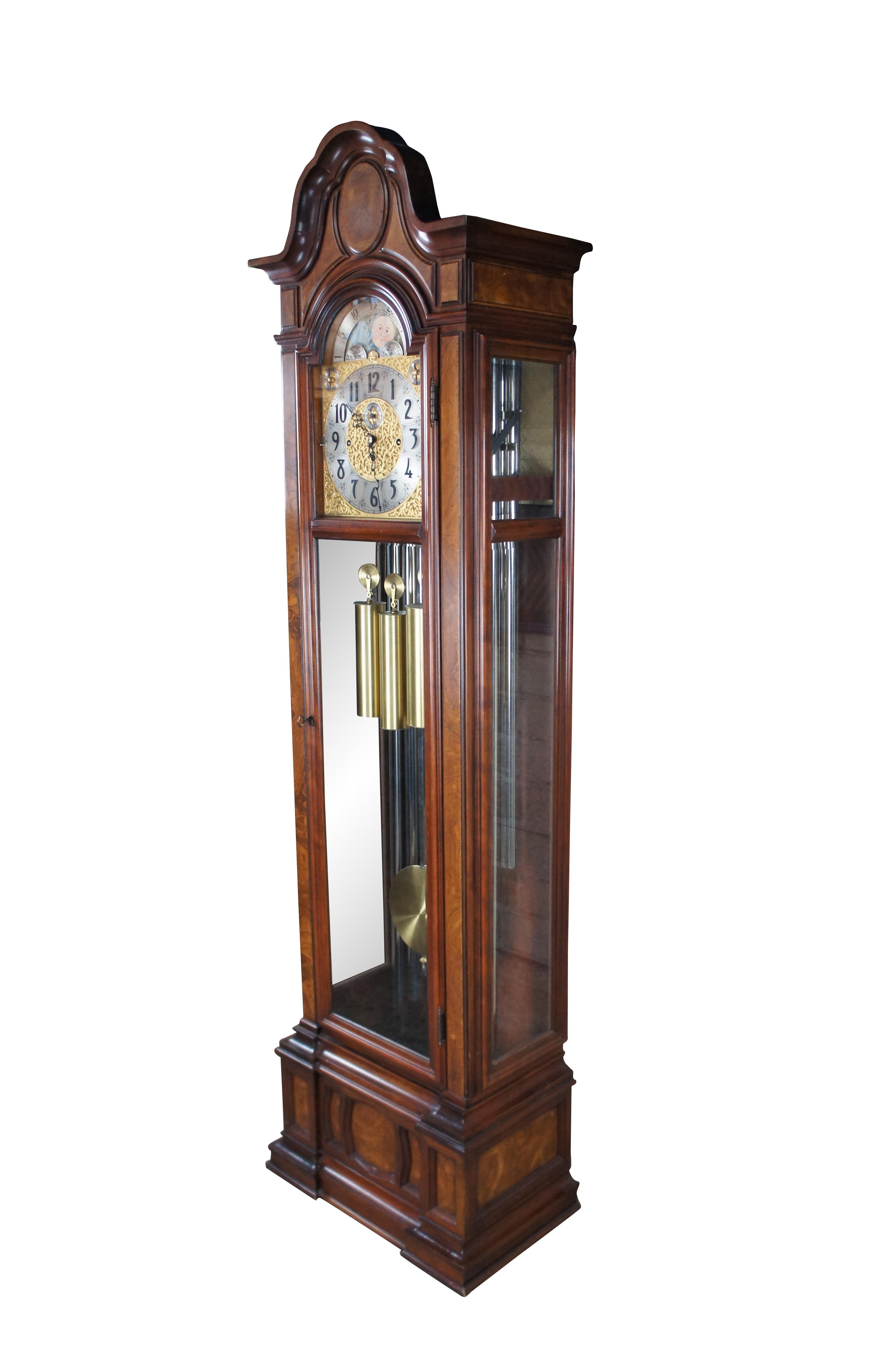 Vintage 1976 Herschede Hall Clock Company tall case grandfather clock, model 230 aka The Sheffield.  Made of cherry featuring serpentine crown with ash burl panels and reticulated 14k gold plated sun and moon face.  Plays / Chimes Whittington,