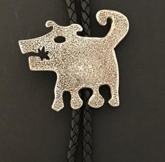 Hershey & His Twin Sons, Rez dog bola tie, Melanie Yazzie designs leather silver