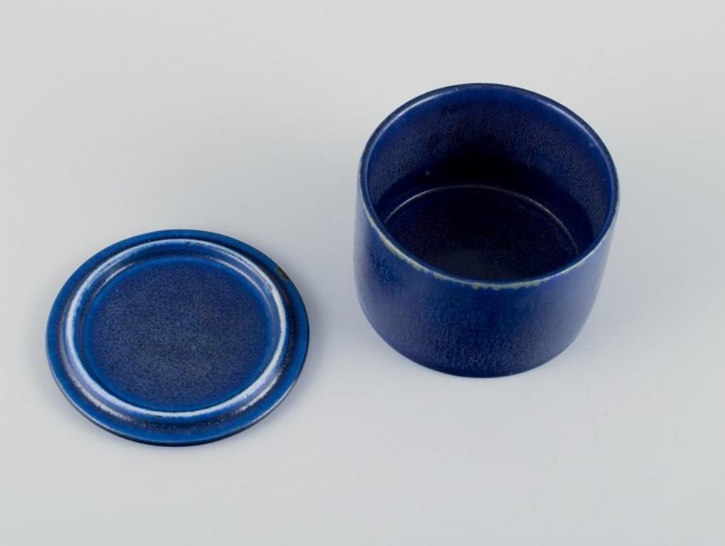 Swedish Herta Bengtsson for Rörstrand. Rare lidded ceramic jar with blue-toned glaze. 