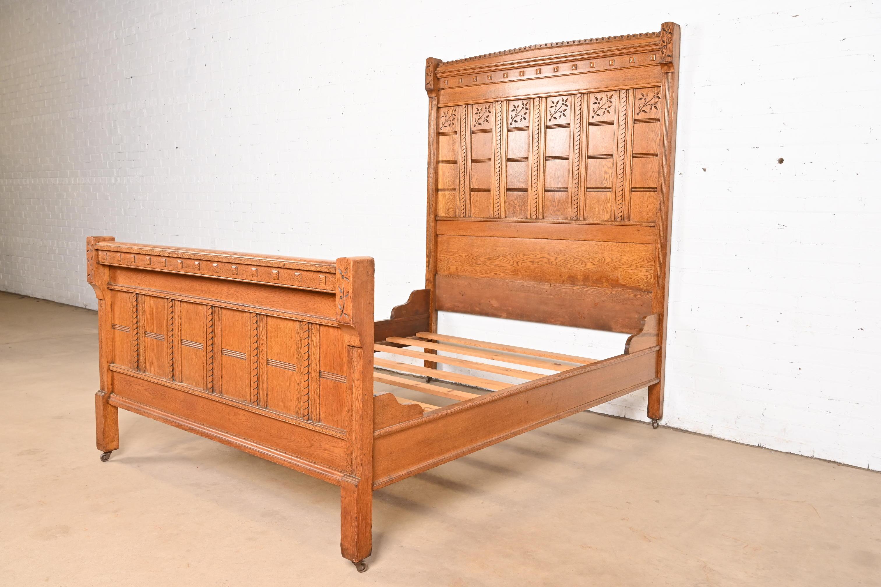 Herter Brothers Style Antique Eastlake Victorian Carved Oak Full Size Bed In Good Condition For Sale In South Bend, IN
