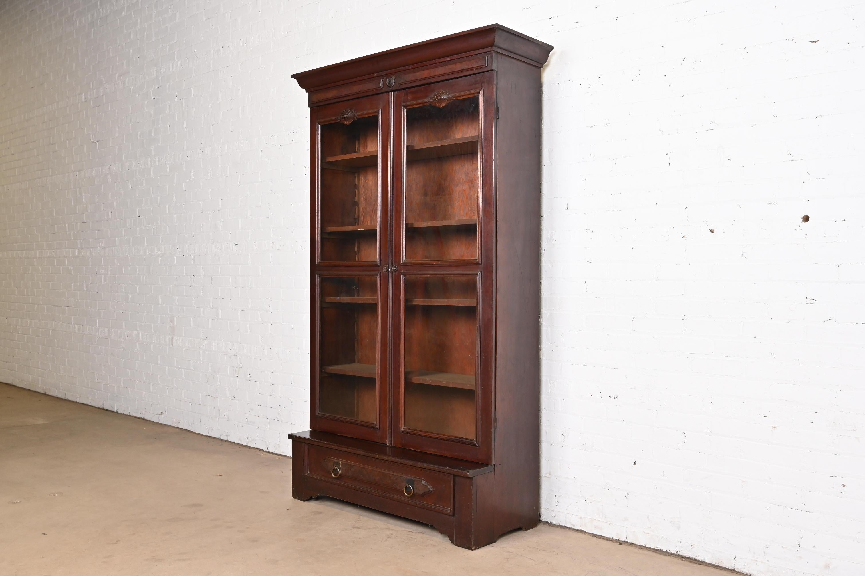 Herter Brothers Style Antique Eastlake Victorian Carved Walnut Bookcase Cabinet In Good Condition For Sale In South Bend, IN