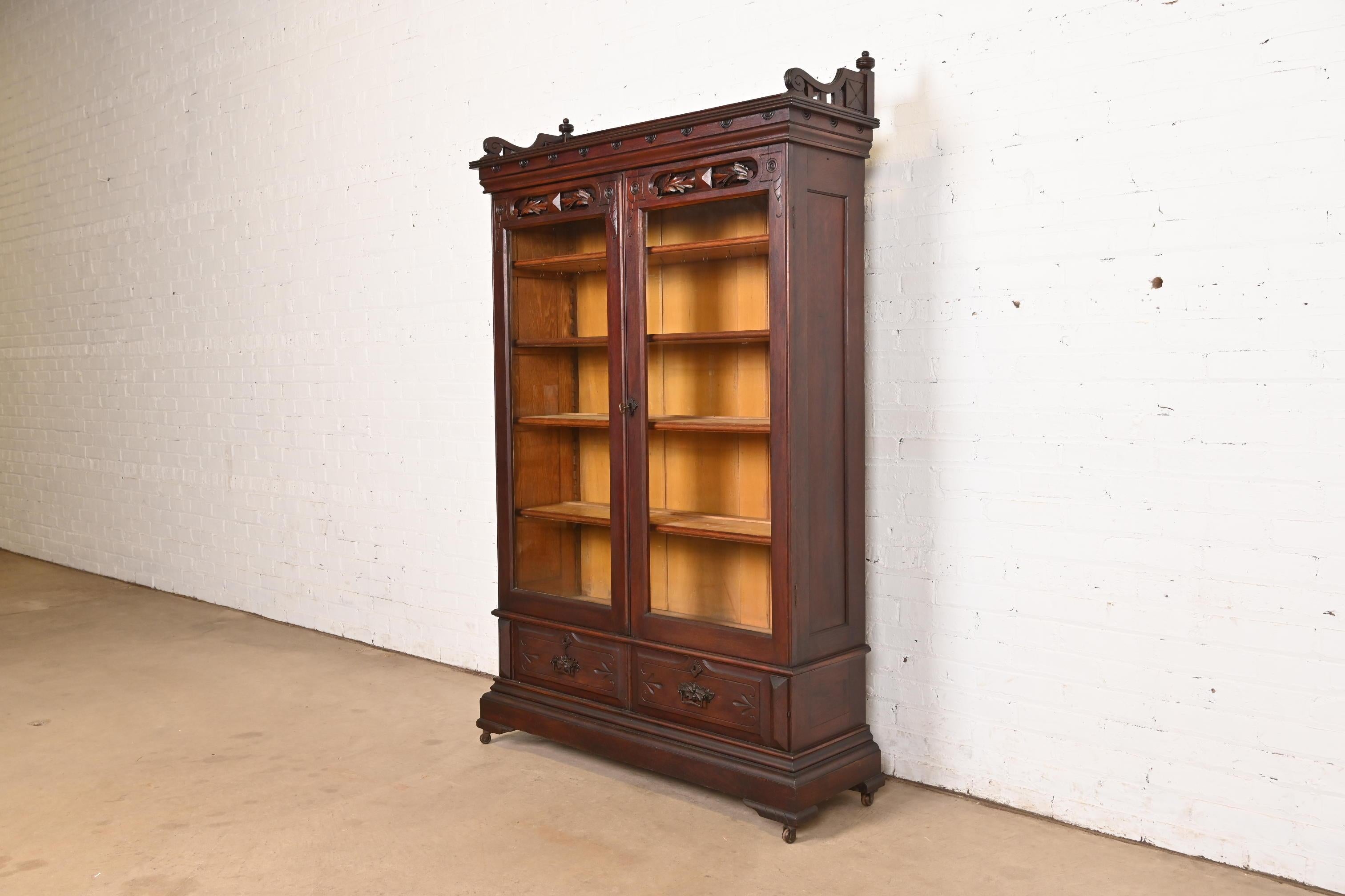 Herter Brothers Style Antique Eastlake Victorian Carved Walnut Bookcase Cabinet In Good Condition For Sale In South Bend, IN