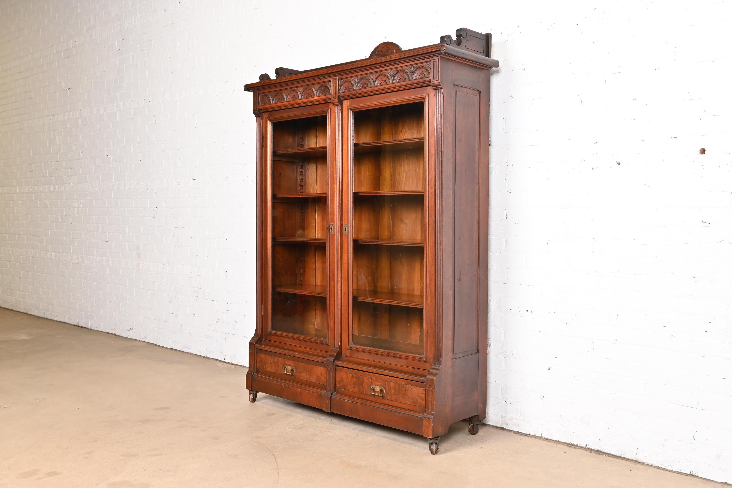 Herter Brothers Style Antique Eastlake Victorian Carved Walnut Bookcase In Good Condition In South Bend, IN