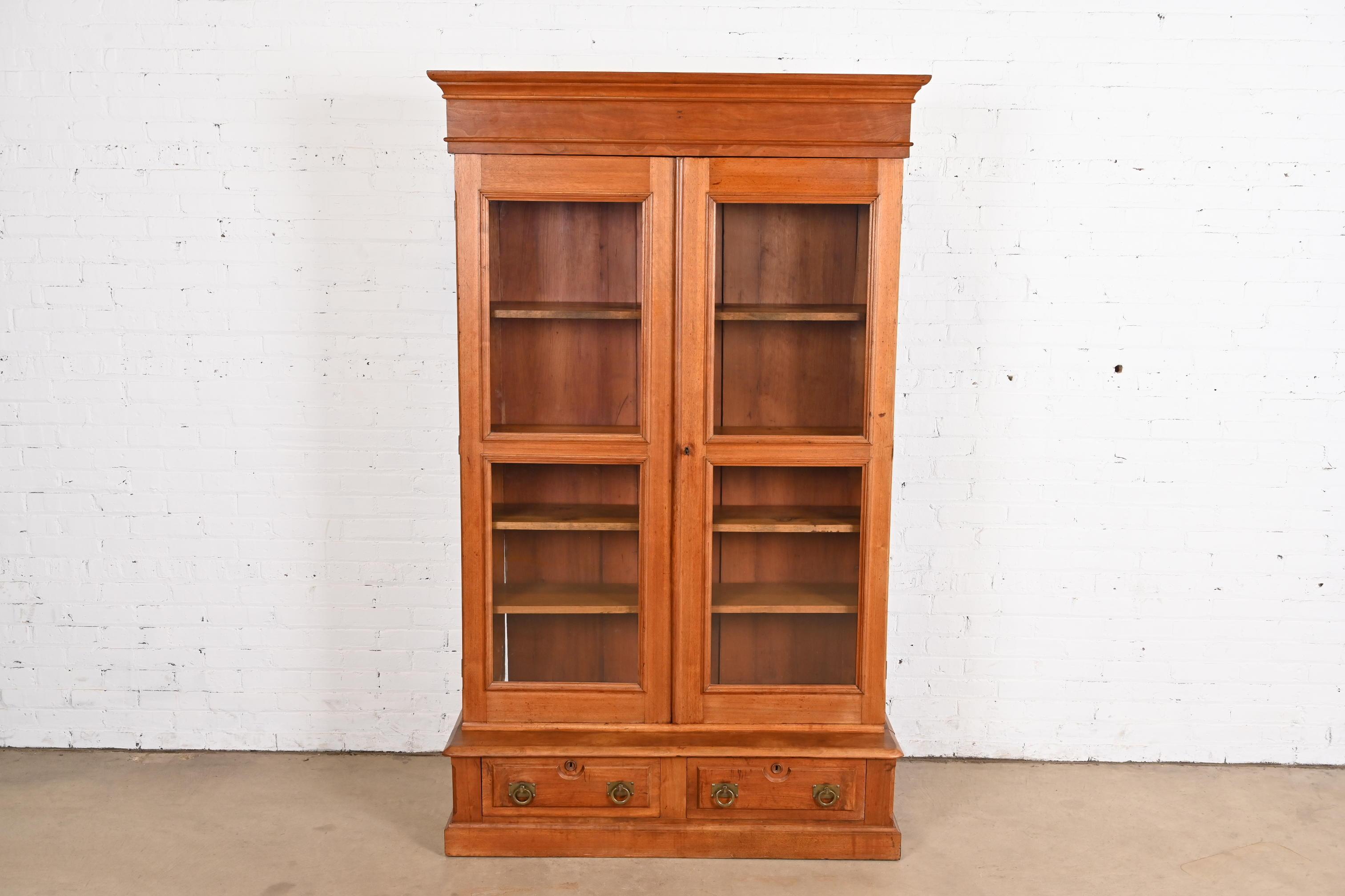 Herter Brothers Style Antique Eastlake Victorian Carved Walnut Bookcase In Good Condition In South Bend, IN