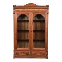 Herter Brothers Style Antique Victorian Carved Walnut Bookcase, Circa 1880s
