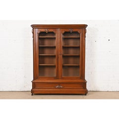 Herter Brothers Style Antique Victorian Carved Walnut Glass Front Bookcase