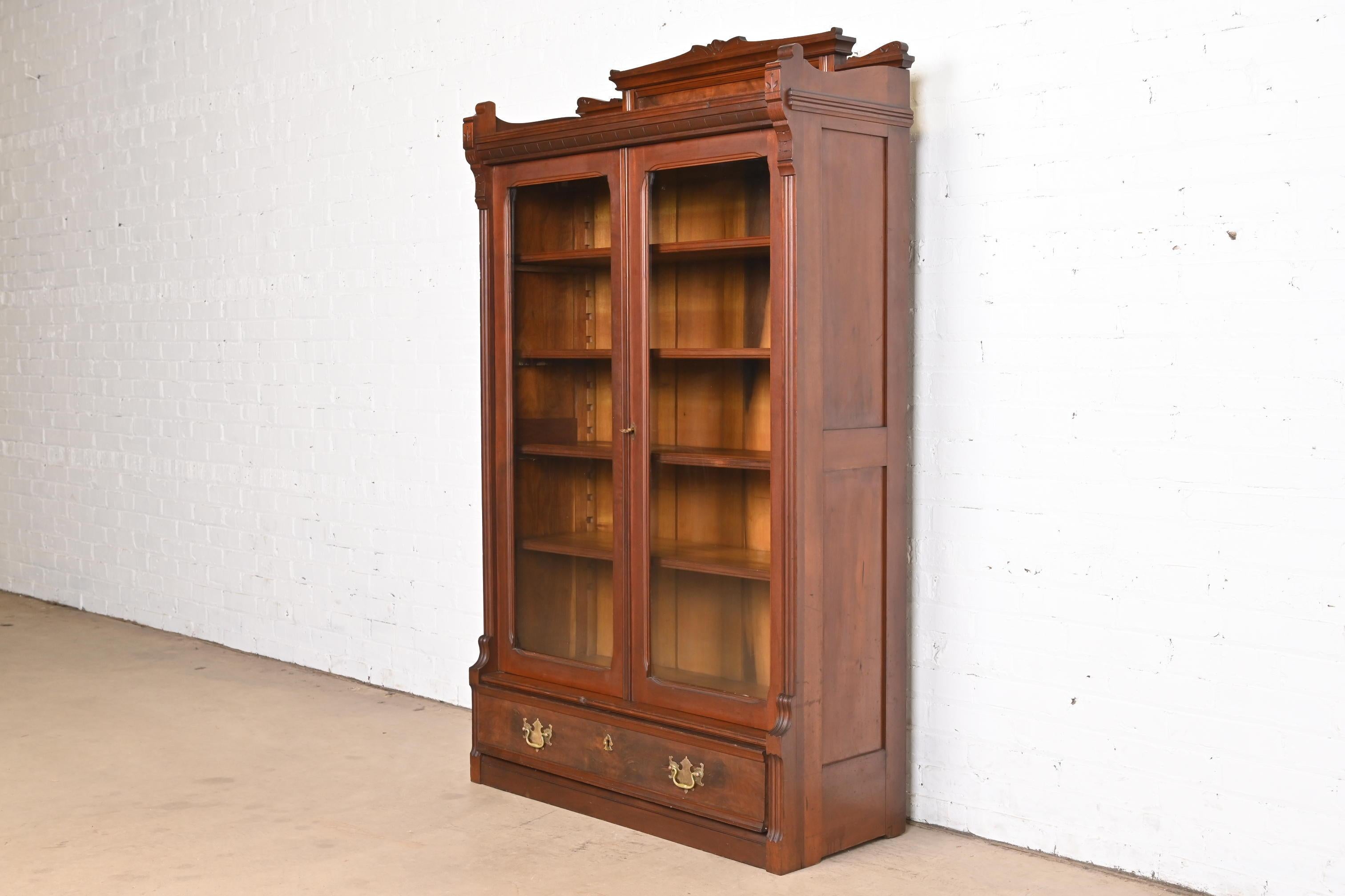 19th Century Herter Brothers Style Eastlake Victorian Carved Walnut and Burl Wood Bookcase