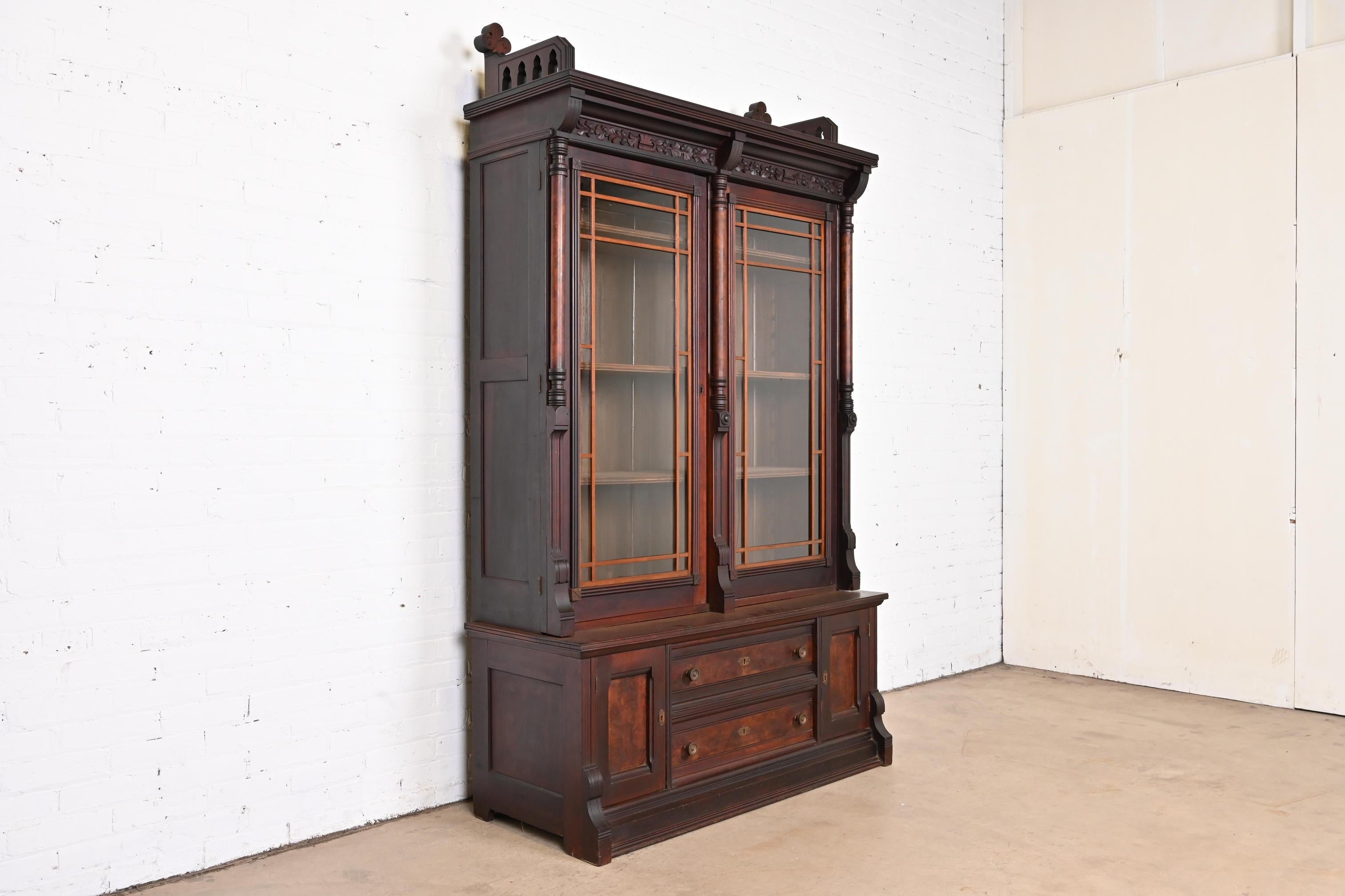 Herter Brothers Style Eastlake Victorian Carved Walnut and Burl Wood Bookcase In Good Condition In South Bend, IN