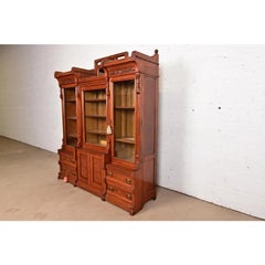 Herter Brothers Style Eastlake Victorian Carved Walnut Bookcase, Circa 1880s