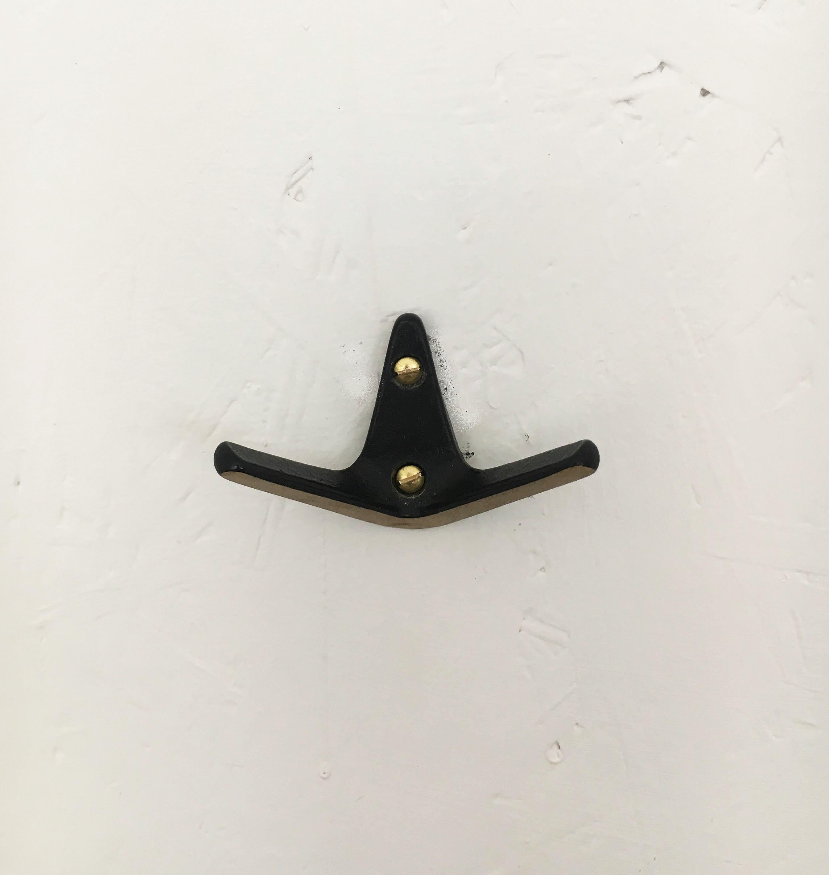 Hertha Baller Blackened Brass Wall Hooks Model 'Döbling'. Beautiful Austrian modernist brass wall hooks, executed in the 1950s by Hertha Baller, Austria. Made of black finished and partly polished brass, very solid, in good condition with lovely