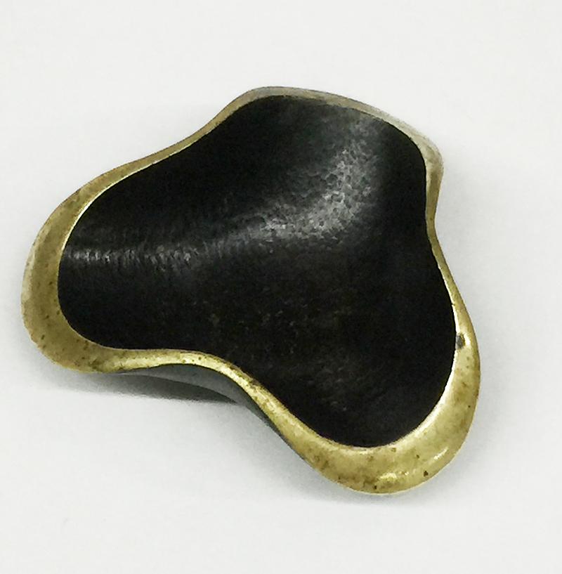 Austrian Bronze Shaped Bowl by Hertha Ballers for Walter Bosse, 1950s

A bronze bowl signed by Hertha Ballers in small organic shaped form.
Designed by Walter Bosse 1950s, Austria
The bowl measures 2.5 cm high and approximate 8 cm diagonal.