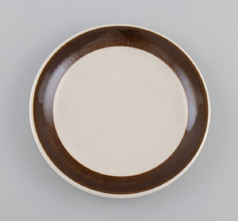 Hertha Bengtson (1917-1993) for Rörstrand. 15 Koka plates in glazed stoneware. 1960s.
Diameter: 17 cm.
In excellent condition.
Stamped.
For almost half a century, Hertha Bengtson was one of Sweden's leading designers in ceramics and glass.