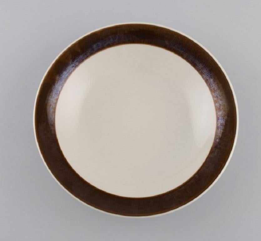 Hertha Bengtson (1917-1993) for Rörstrand. Six deep Koka plates in glazed stoneware. 1960s.
Measures: 20.5 x 4.5 cm.
In excellent condition.
Stamped.
For almost half a century, Hertha Bengtson was one of Sweden's leading designers in ceramics