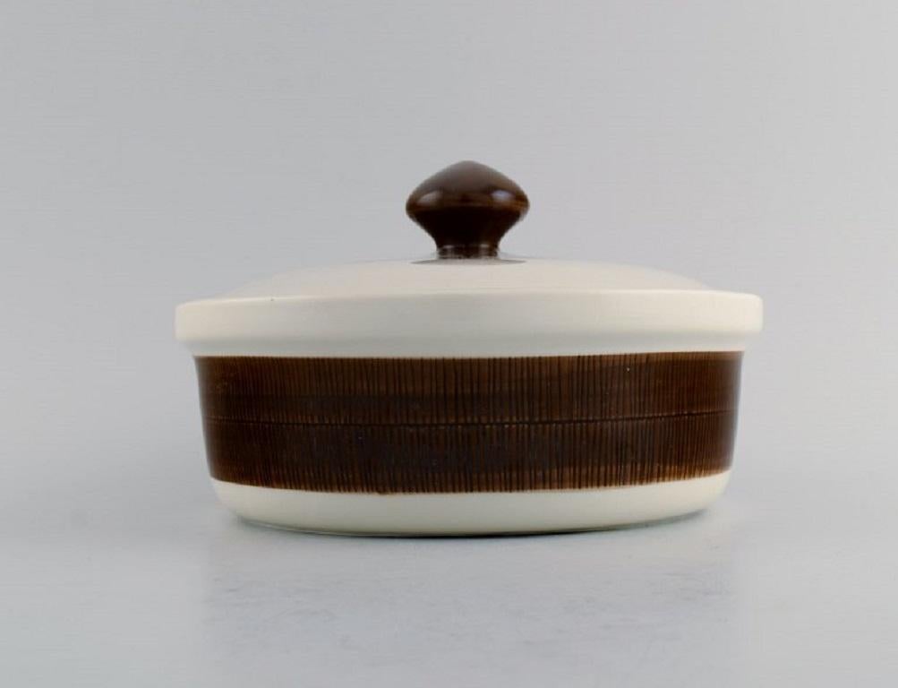 Hertha Bengtson (1917-1993) for Rörstrand. 
Two Koka lidded tureens in glazed stoneware. 1960s.
Measures: 21 x 13 cm.
In excellent condition.
Stamped.
For almost half a century, Hertha Bengtson was one of Sweden's leading designers in ceramics