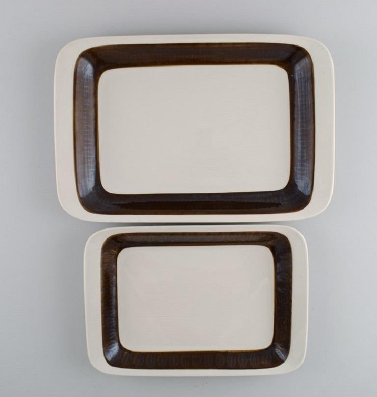 Hertha Bengtson (1917-1993) for Rörstrand. 
Two Koka serving dishes in glazed stoneware. 1960s.
Largest measures: 36.5 x 24 cm.
In excellent condition.
Stamped.
For almost half a century, Hertha Bengtson was one of Sweden's leading designers in