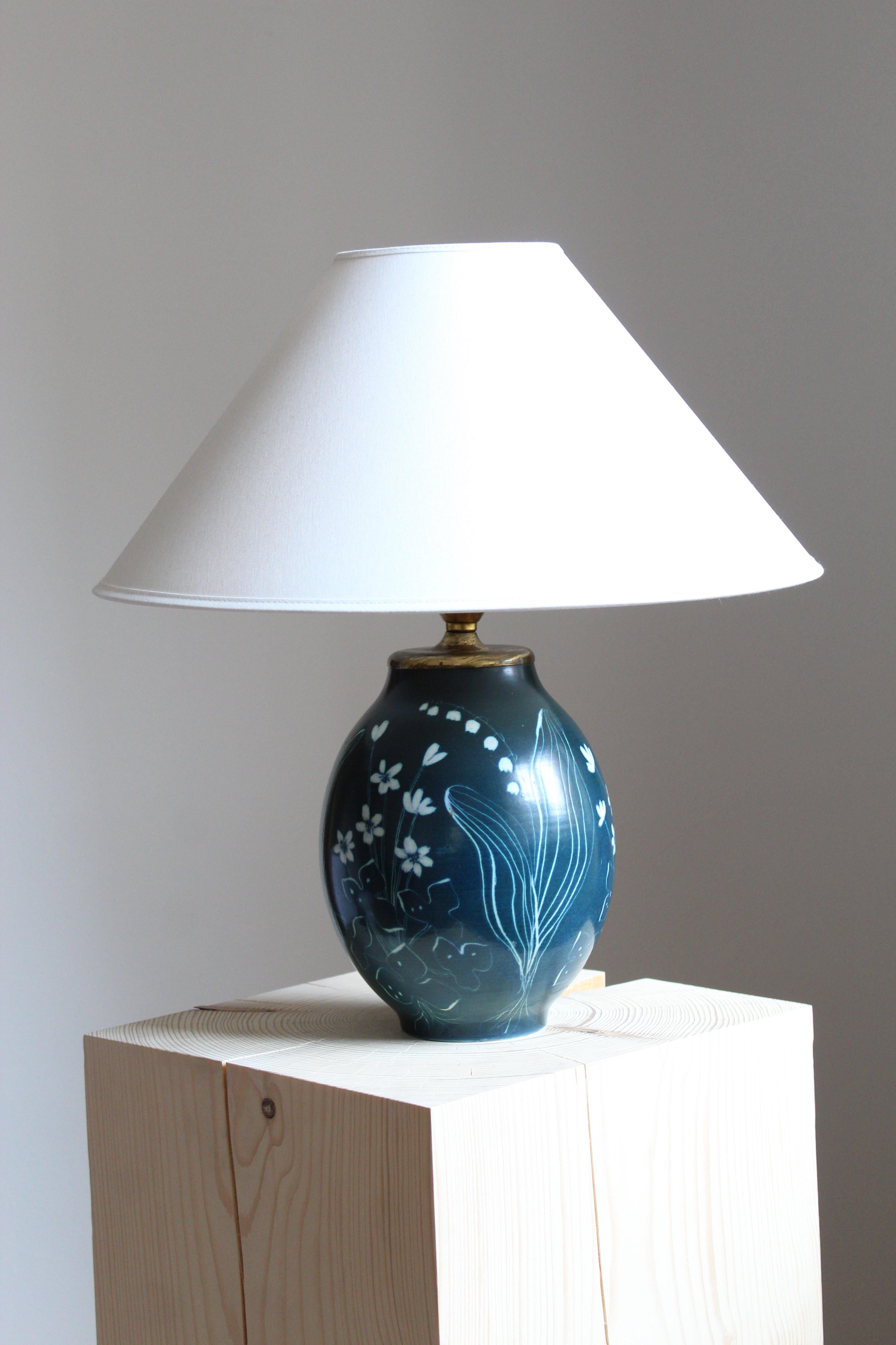 A table lamp produced by Rörstrand, Sweden, 1950. Designed by Hertha Bengtsson, (Swedish, 1914-1997). Signed.

Sold without lampshade. Stated dimensions excluding lampshade.

Other ceramicists of the period include Axel Salto, Carl-Harry
