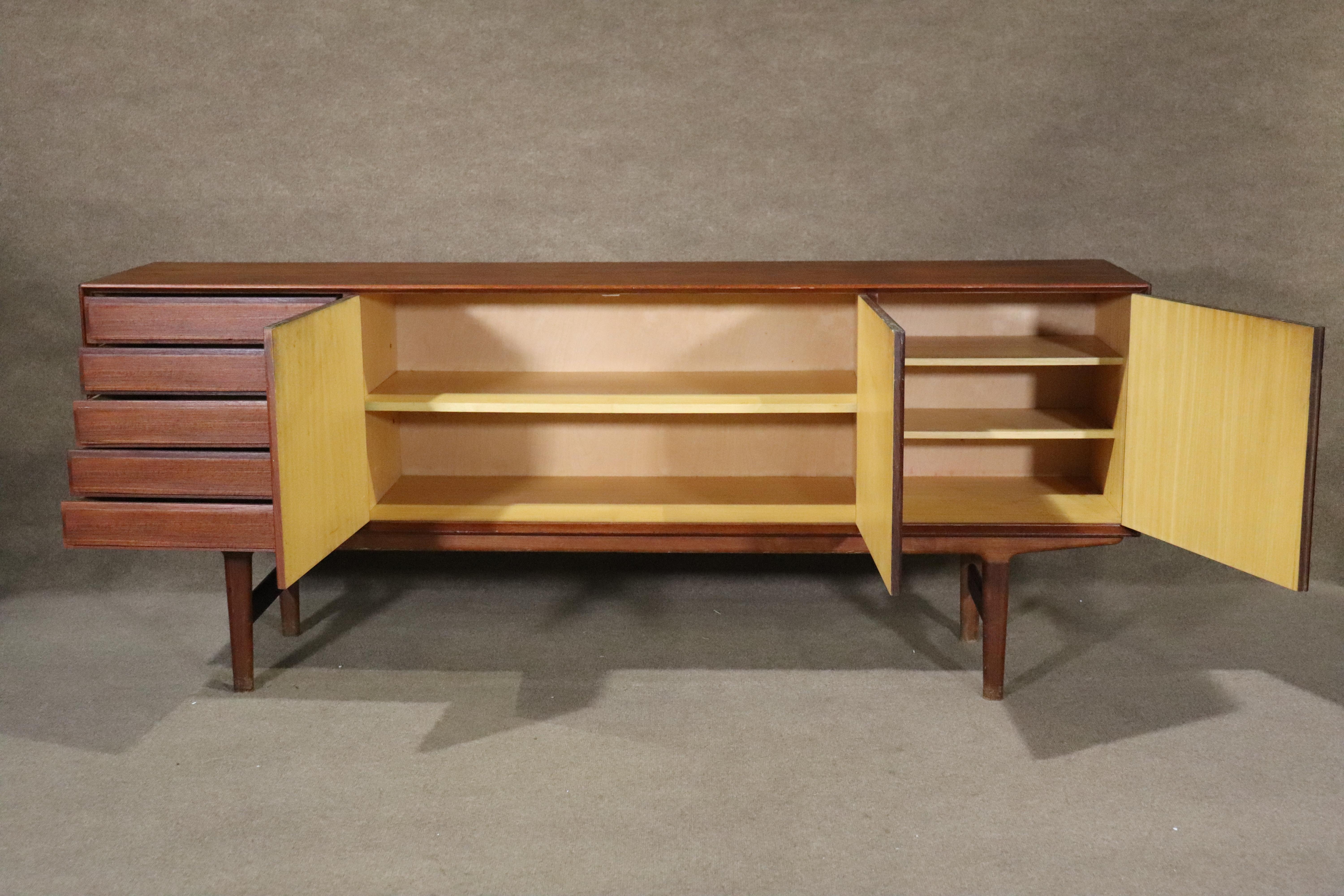 Long 6+ foot Danish sideboard by Fredrik Kayser. Four drawers and three doors that open to two storage cabinets. Handsome Danish mid-century design.
Please confirm location NY or NJ
