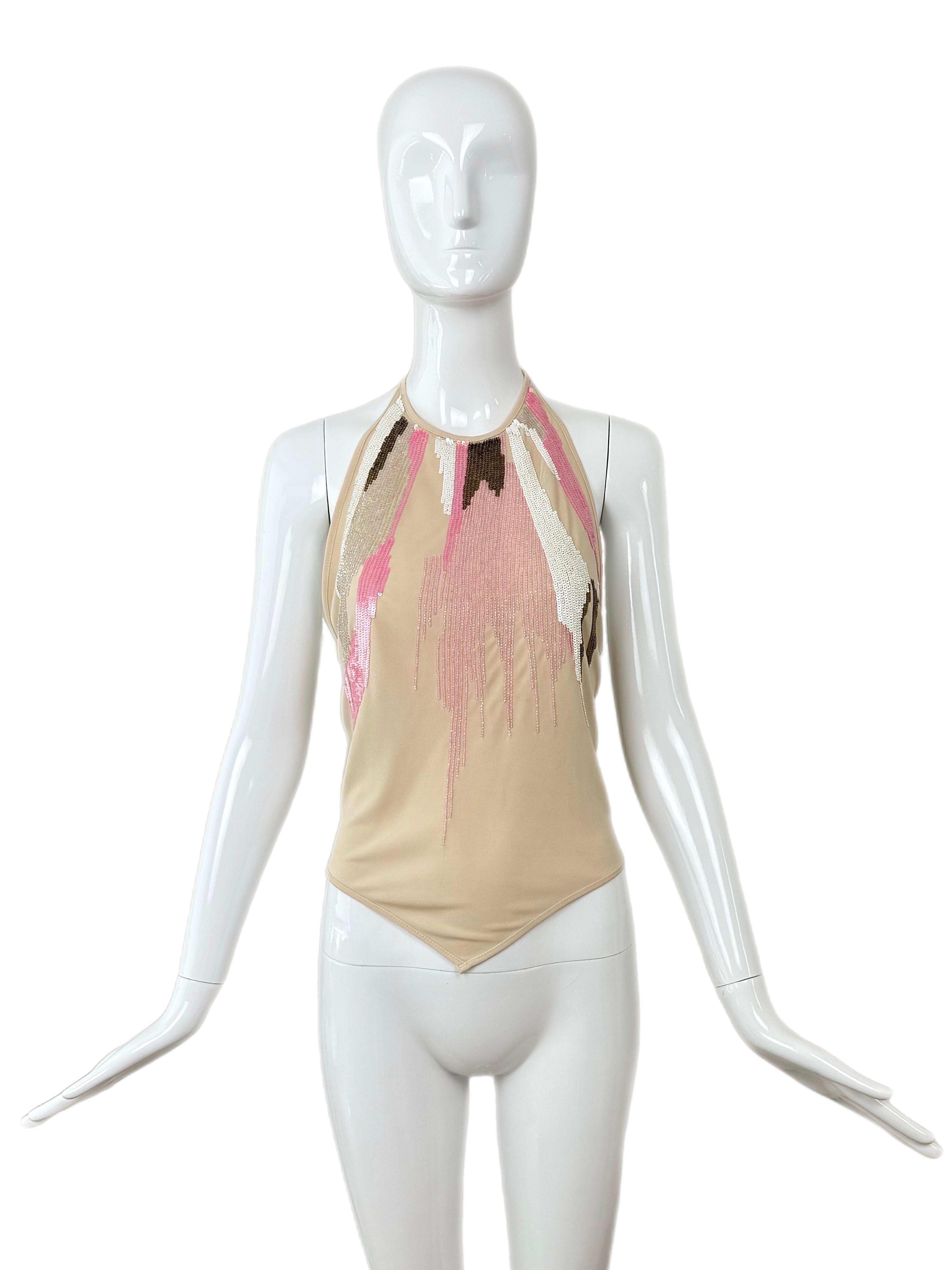 Herve Leger
1990's
Vintage
Beige
White, Bronze, + Pink sequins and beading
Adjustable halter top
Open back
Pullover
Unique V cut bottom
Stretchy
Size F38 USA 6
Excellent vintage condition, minor feeling of wear
Measurements in inches laying flat: