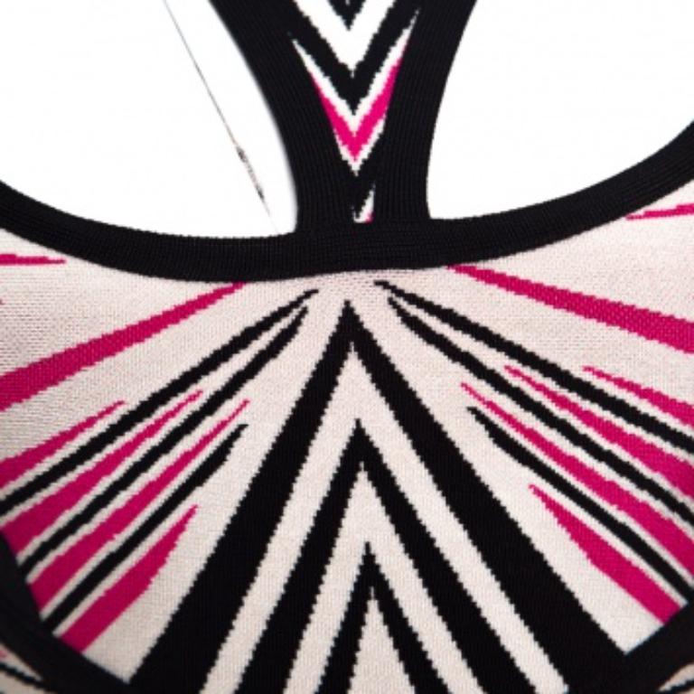 Sewn in a coquettish fashion, this Anaya dress from Herve Leger is a stunning evening dress that will leave your audience drooling over your style. The Aztec pattern blends perfectly with the cutout details, and the feminine colours make it a