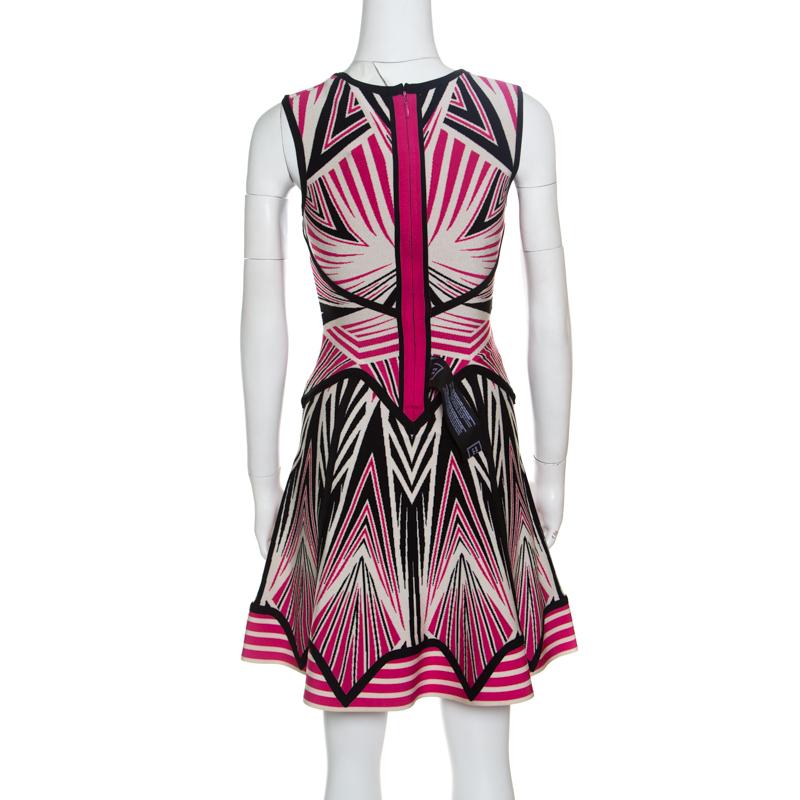 Sewn in a coquettish fashion, this Anaya dress from Herve Leger is a stunning evening dress that will leave your audience drooling over your style. The Aztec pattern blends perfectly with the cutout details, and the feminine colours make it a