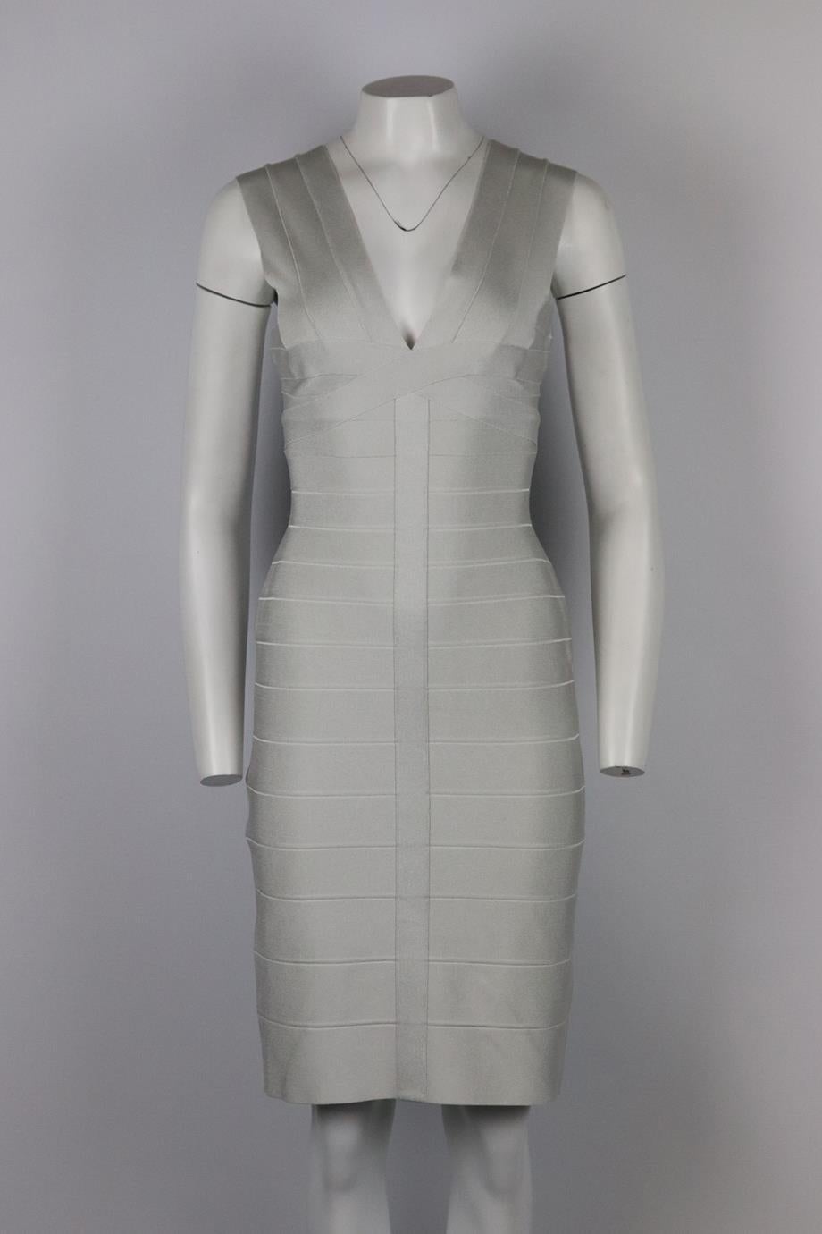 Herve Leger bandage mini dress. Light-grey. Sleeveless, v-neck. Zip fastening at back. 90% Rayon, 9% nylon, 1% elastane. Size: Large (UK 12, US 8, FR 40, IT 44). Bust: 31 in. Waist: 26 in. Hips: 36 in. Length: 39 in. Very good condition - Few very