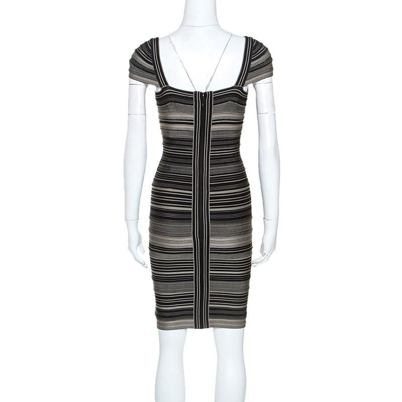 Make room in your closet for this smart dress from the house of Herve Leger. Designed for a leading-edge look, this bicolored attire is fabulous for any event. It is tailored in a blend of fabrics featuring the iconic bandage style and is a perfect