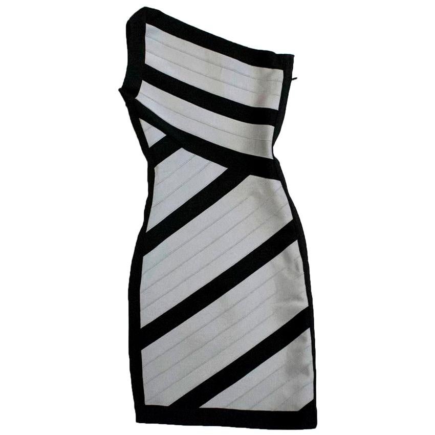 Herve Leger black and grey, one shouldered strap, bandage body-con mini dress. 

Condition: 10/10

Approx measurements:
Measurements are taken with the item lying flat, seam to seam.
Length: 82cm 
Bust: 32cm 
Waist: 26cm Hips: 30cm

US size 4 and