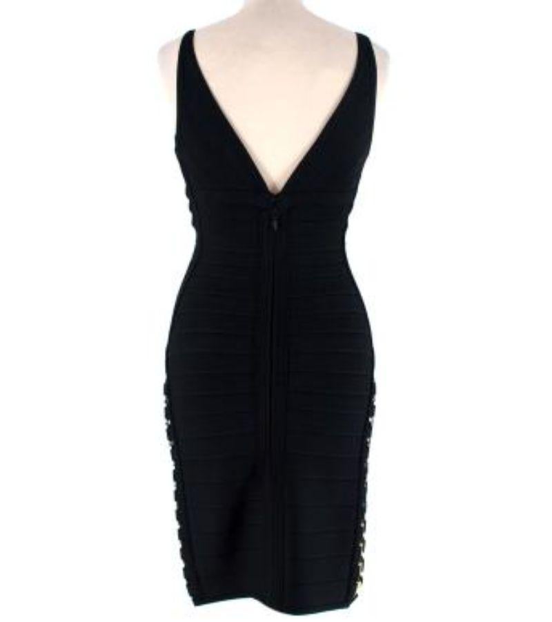 Herve Leger Black Bandage Dress with Gold-Tone Hardware

- Signature stretch knit bandage dress adorned with gold-tone hardware down the side seams
- Concealed hook and zip fastening at back
- Plunging V-neckline
- Form fit

Material: 
90% Rayon
9%