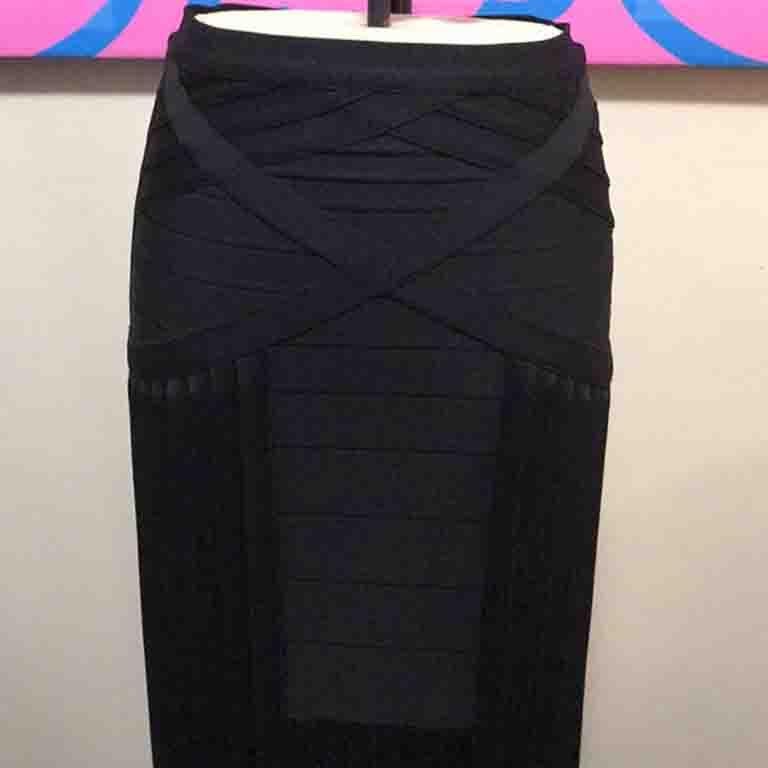 Herver Leger is known for his panel dresses and other clothing. This knit bandage skirt with fringe is an outstand example of his work. Perfect for special occasion dressing worn with a crop top, body suit or blouse! This is a very heavy and