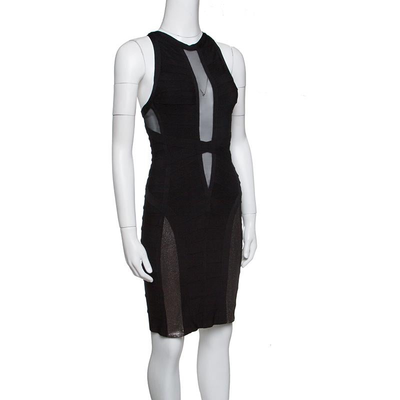 Dress up in this blended fabric dress that guarantees fluent style. Style this black number with contrasting accessories for a unique look. This Herve Leger dress is the ultimate symbol of class and sophistication.

Includes: The Luxury Closet