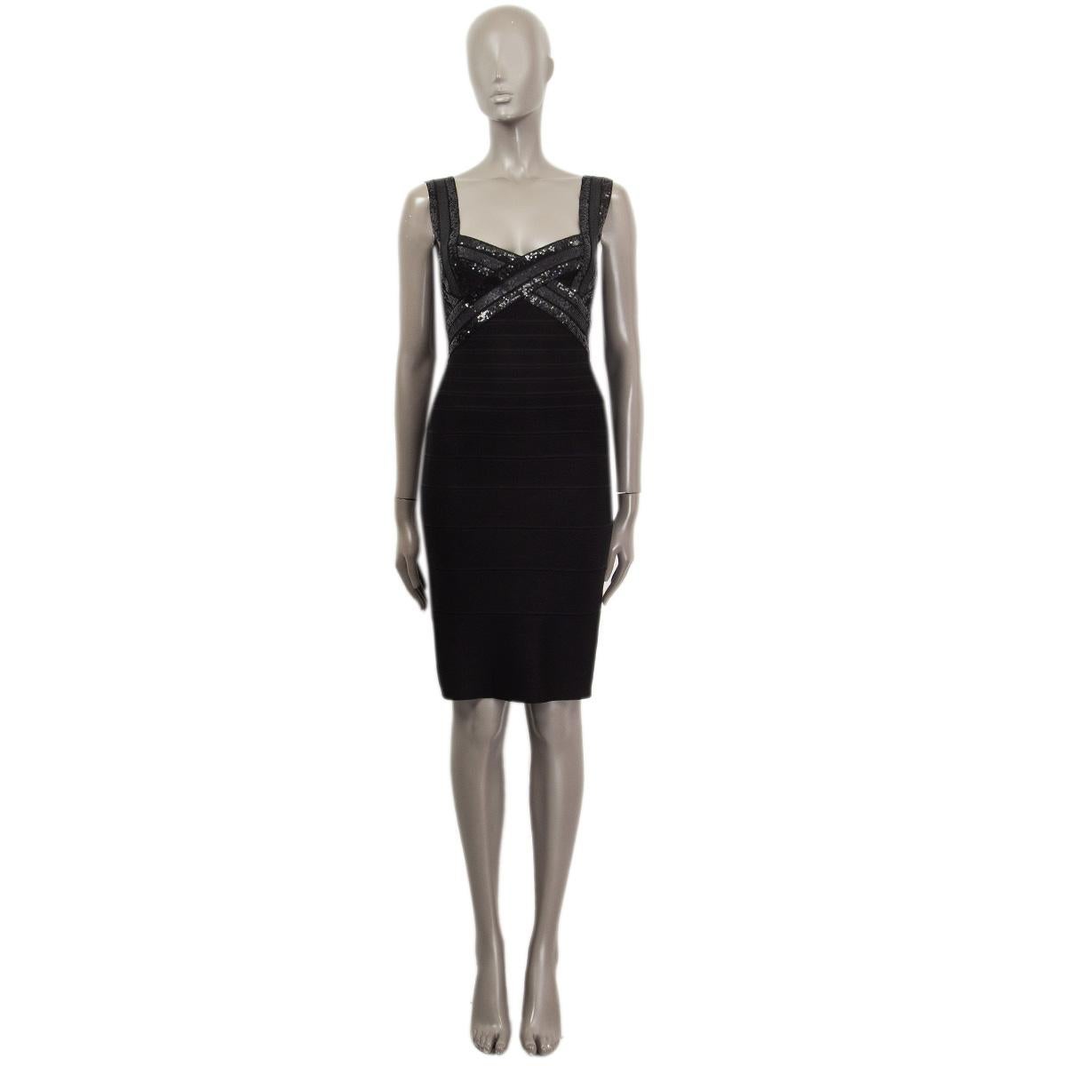 100% authentic Herve Leger sleeveless bandage dress in black rayon (90%), nylon (9%) and spandex (1%). Embellished with black sequins on the front and the back. Closes with one hook-and-eye closure and concealed zipper on the back. Unlined. Has been