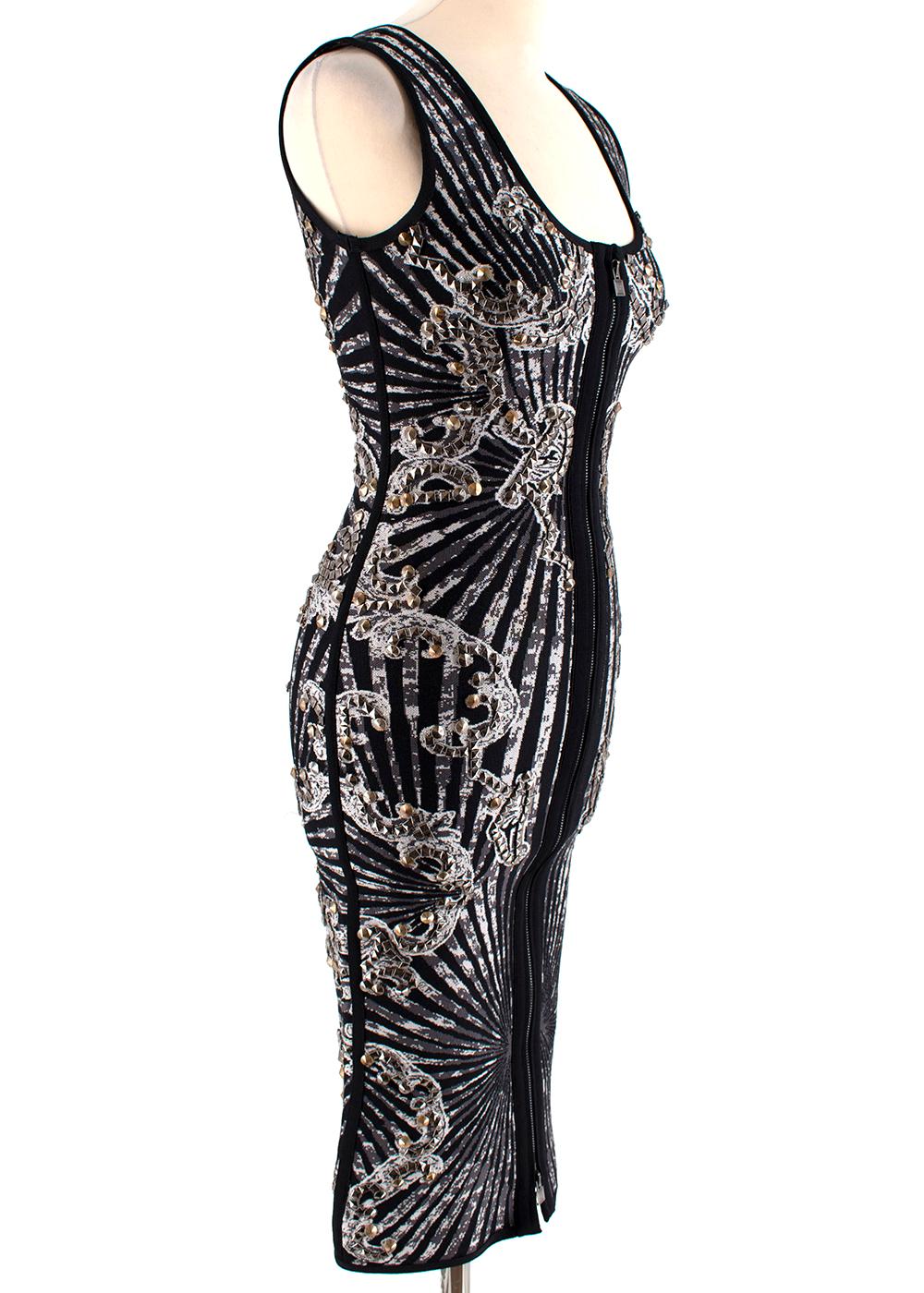 Herve Leger Black Studded Patterned Zip-Front Dress

- Silver and Gold Studded
- Heavy Material 
- Double Zip Fastening with Fish eye and hook
- Black boning contrast detail 


Material 
- 75% Rayon
- 23% Nylon
- 2% Spandex
Contrast
- 90% Rayon 
-