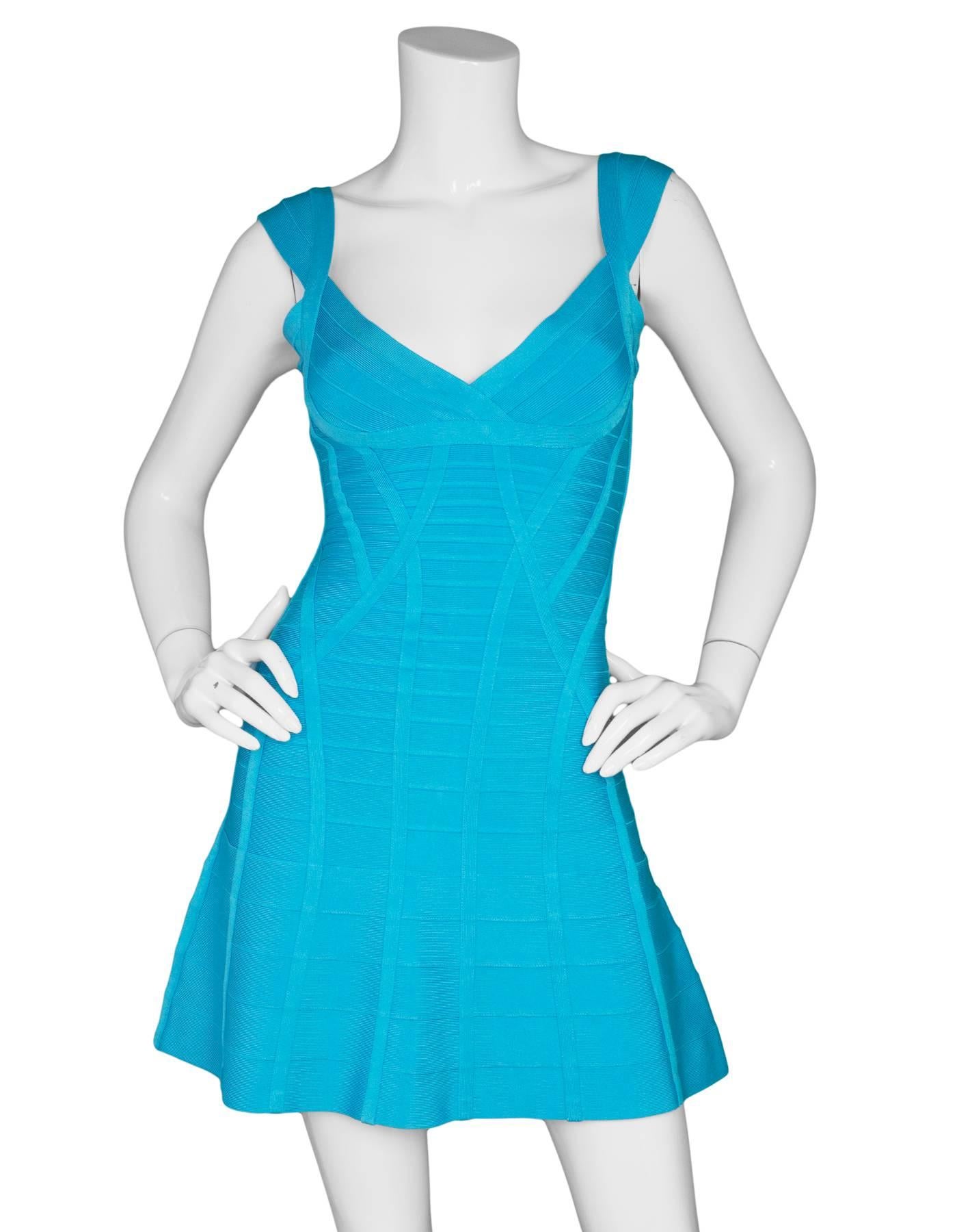 Herve Leger Blue Bandage Flare Dress Sz S

Made In: China
Color: Blue
Composition: 90% Rayon, 9% Nylon, 1% Spandex
Lining: None
Closure/Opening: Zip closure at back
Exterior Pockets: None
Interior Pockets: None
Overall Conditon: Excellent pre-owned