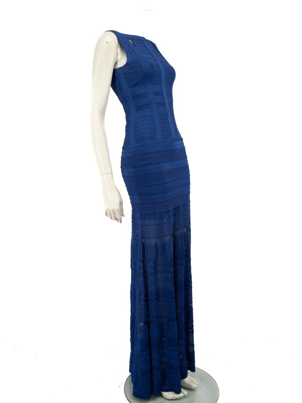 CONDITION is Good. Minor wear to the dress is evident, there is discolouration on the internal neckline, the outer and internal underarm. The front of the dress has a small pull to the weave on the bottom flare and the back of the dress has two