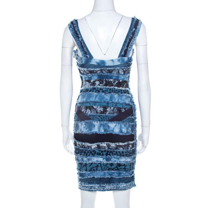 This Herve Leger dress makes for an exquisite wardrobe essential paired with the right kind of accessories. This versatile blended fabric dress offers you utmost comfort coupled with sophistication. Finely tailored in a shade of blue featuring the
