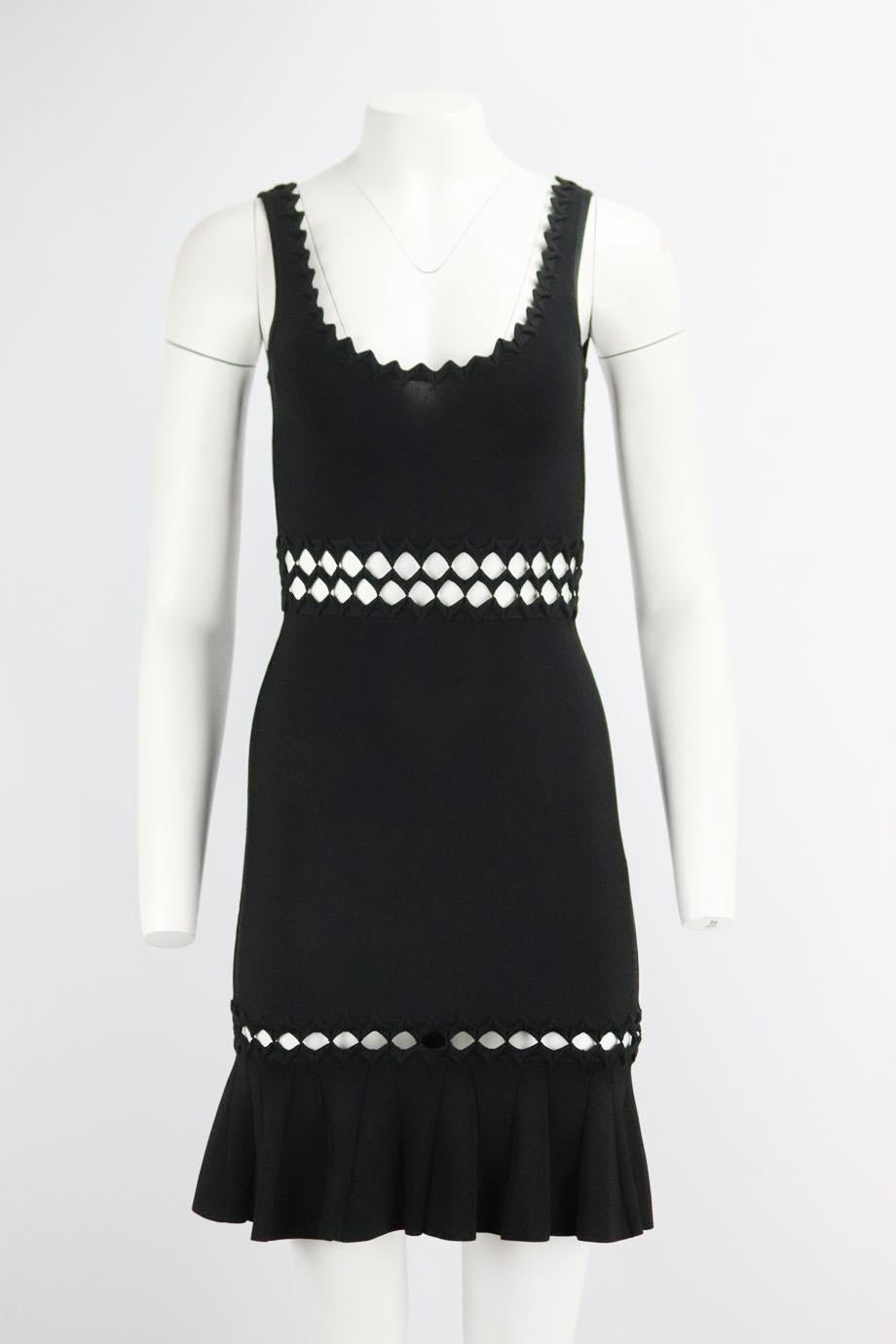 Herve Leger cutout stretch knit mini dress. Black. Sleeveless, crewneck. Hook and zip fastening at back. 90% Rayon, 9% nylon, 1% spandex. Size: XSmall (UK 6, US 2, FR 34, IT 38). Bust: 27 in. Waist: 23 in. Hips: 26.5 in. Length: 34 in. Very good
