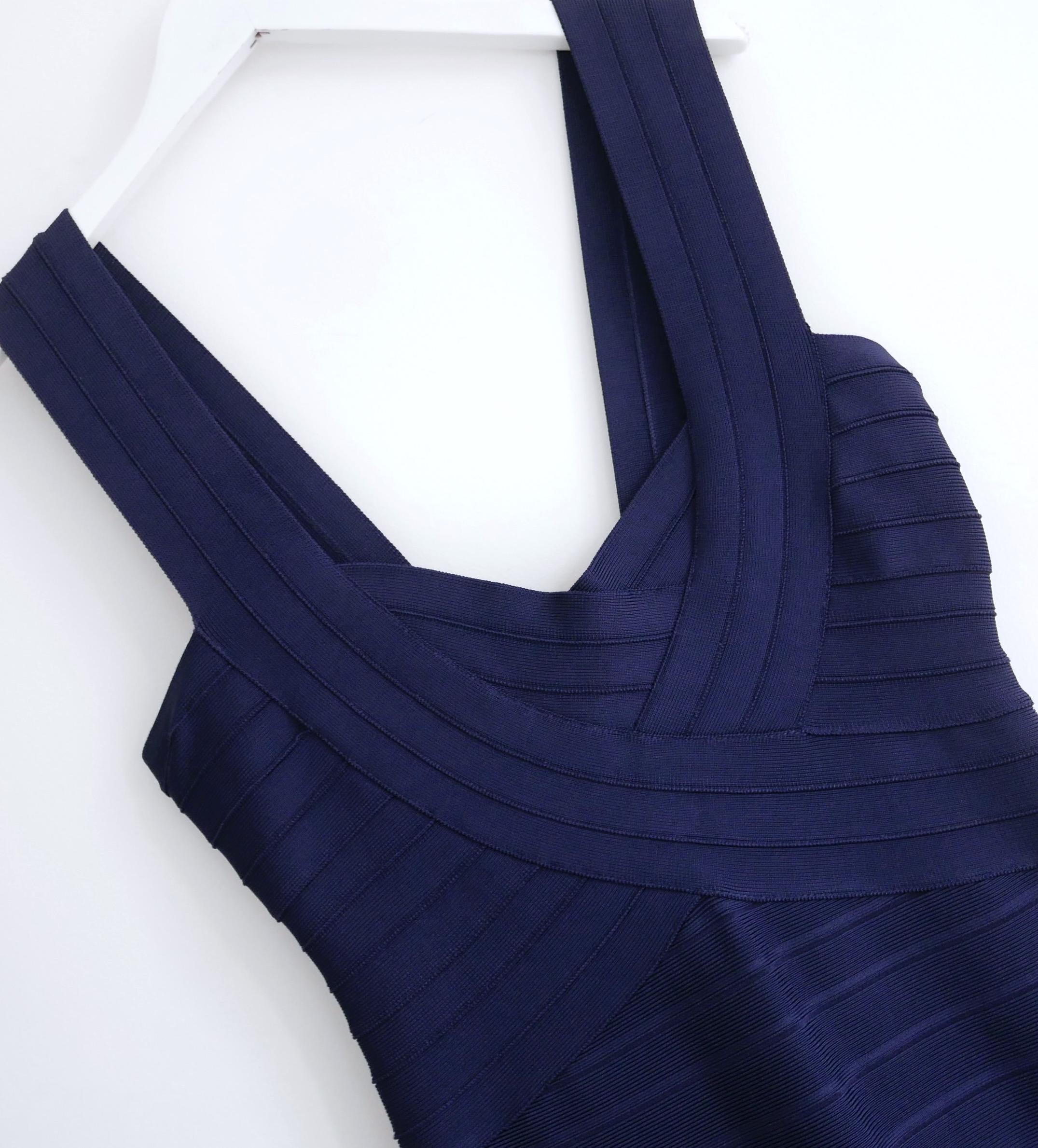 Super flirty Herve Leger Elisha dress - bought for £1150 and unworn. Made from Leger's signature super stretchy, thick 'cinch you in' rayon mix in classic navy blue. It has super flattering fit and flare bandage construction with cross over