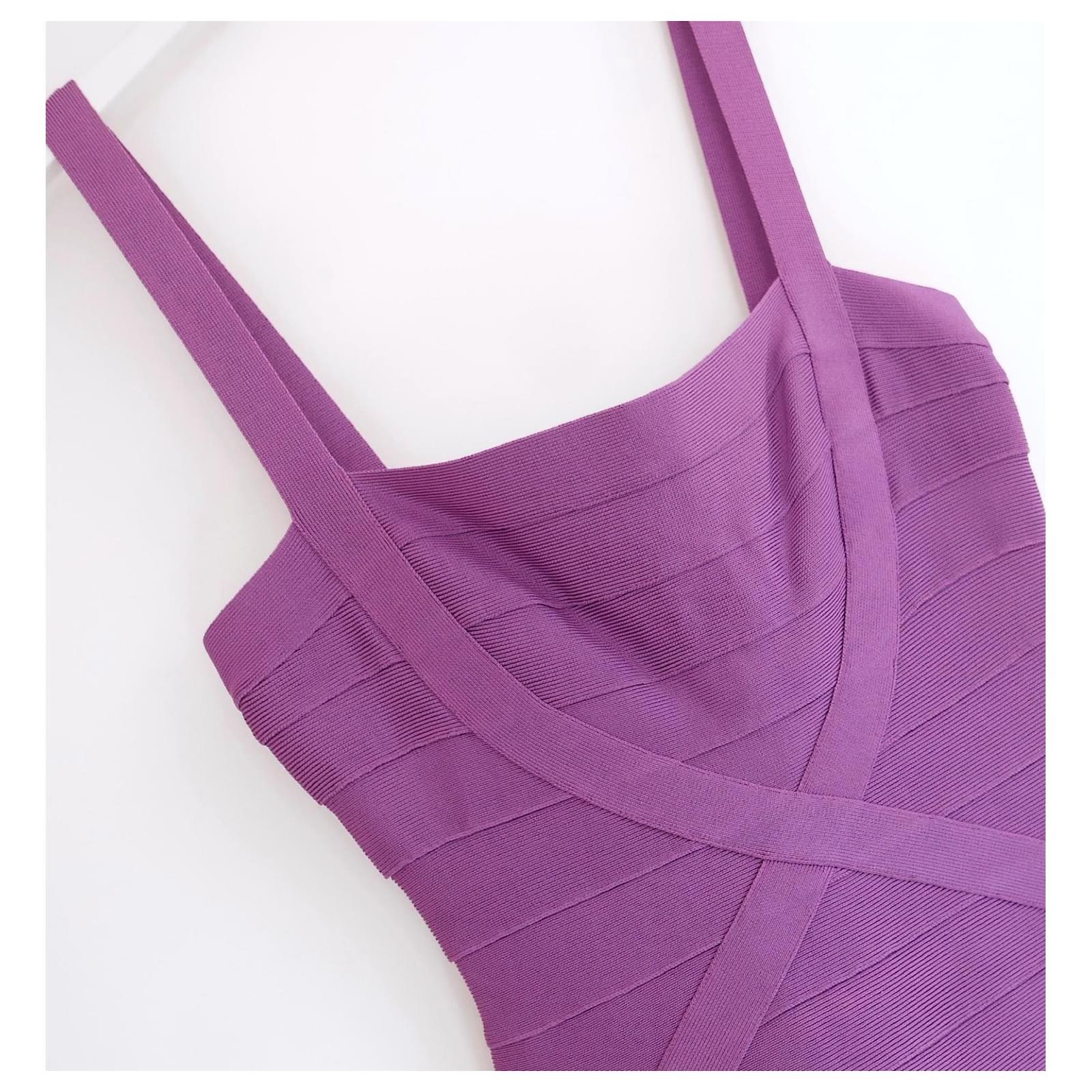 Super flirty Herve Leger Faith dress - bought for £1199 and new with tags. Made from Leger's signature super stretchy, thick 'cinch you in' rayon mix in a gorgeous shade of violet purple. It has super flattering fit and flare bandage construction